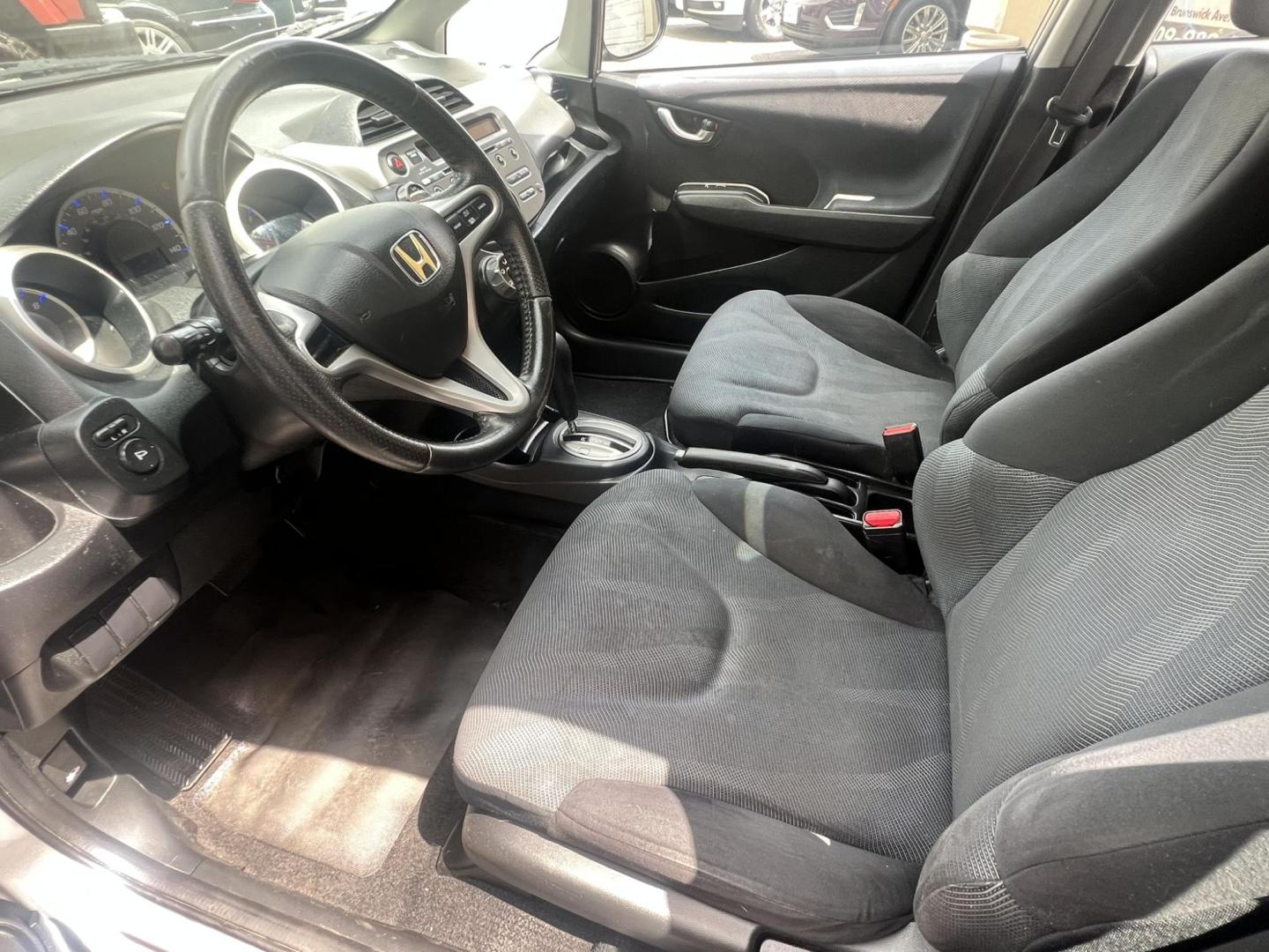 2009 GRAY /Gray Honda Fit Sport (JHMGE88419C) with an 1.5L L4 SOHC 16V engine, Automatic transmission, located at 1018 Brunswick Ave, Trenton, NJ, 08638, (609) 989-0900, 40.240086, -74.748085 - Photo#24