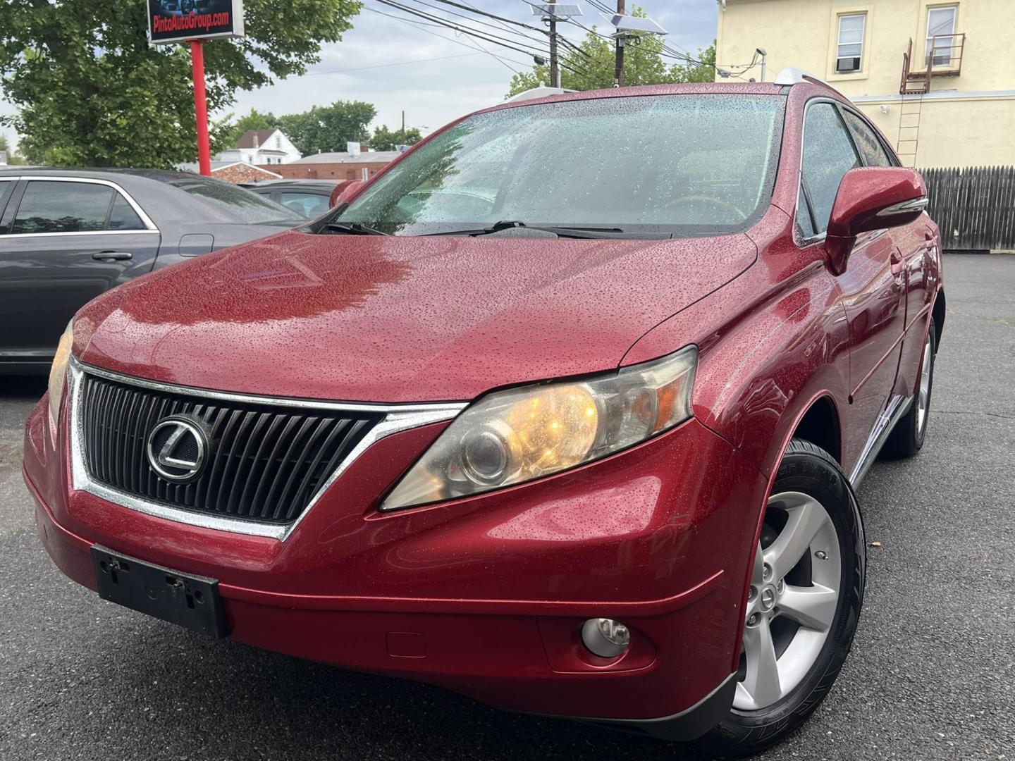 2010 Red /Black Lexus RX 350 AWD (JTJBK1BA4A2) with an 3.5L V6 DOHC 24V engine, 5-Speed Automatic transmission, located at 1018 Brunswick Ave, Trenton, NJ, 08638, (609) 989-0900, 40.240086, -74.748085 - Photo#1