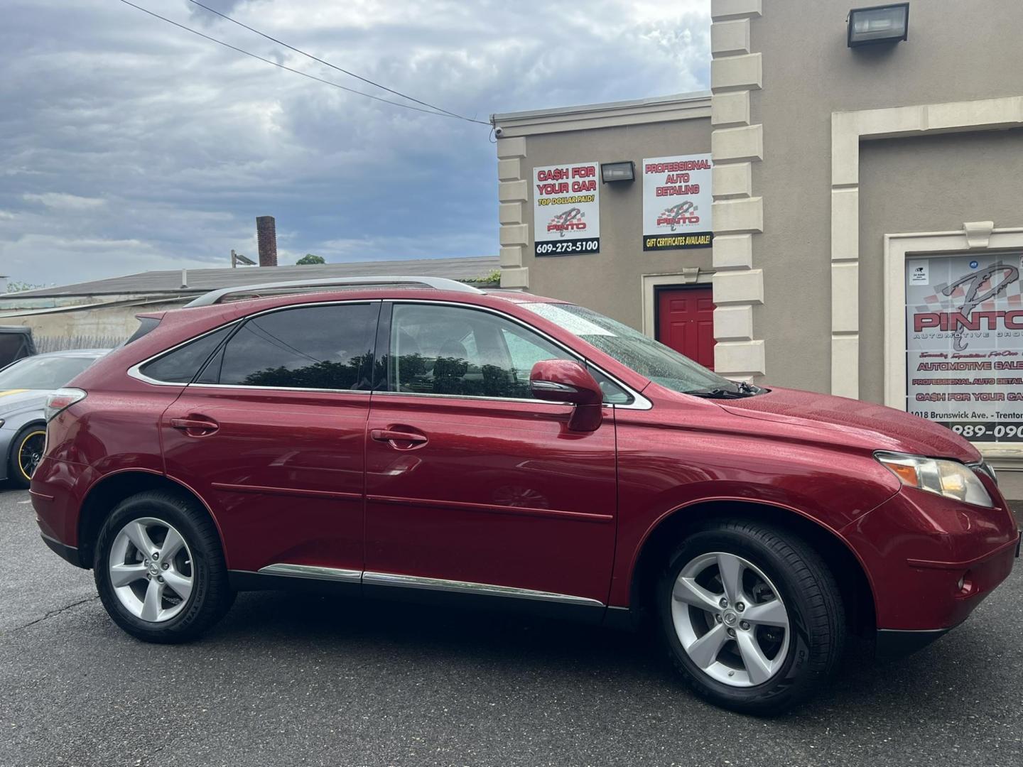 2010 Red /Black Lexus RX 350 AWD (JTJBK1BA4A2) with an 3.5L V6 DOHC 24V engine, 5-Speed Automatic transmission, located at 1018 Brunswick Ave, Trenton, NJ, 08638, (609) 989-0900, 40.240086, -74.748085 - Photo#4