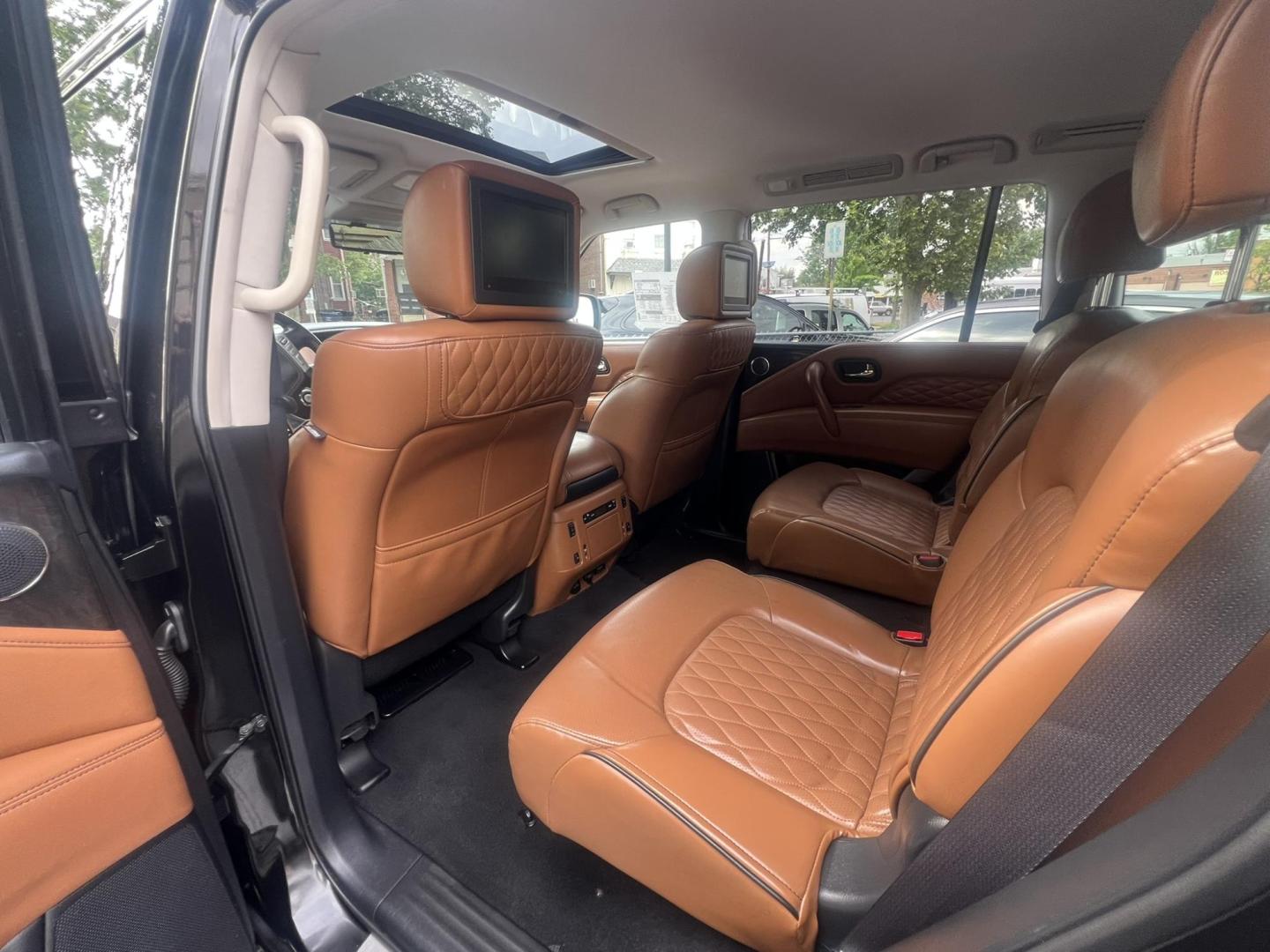 2018 BLACK /Tan Leather Infiniti QX80 4WD (JN8AZ2NE1J9) with an 5.6L V8 DOHC 32V engine, 7A transmission, located at 1018 Brunswick Ave, Trenton, NJ, 08638, (609) 989-0900, 40.240086, -74.748085 - Photo#5
