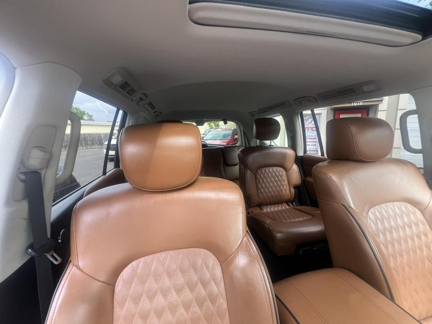 2018 BLACK /Tan Leather Infiniti QX80 4WD (JN8AZ2NE1J9) with an 5.6L V8 DOHC 32V engine, 7A transmission, located at 1018 Brunswick Ave, Trenton, NJ, 08638, (609) 989-0900, 40.240086, -74.748085 - Photo#25