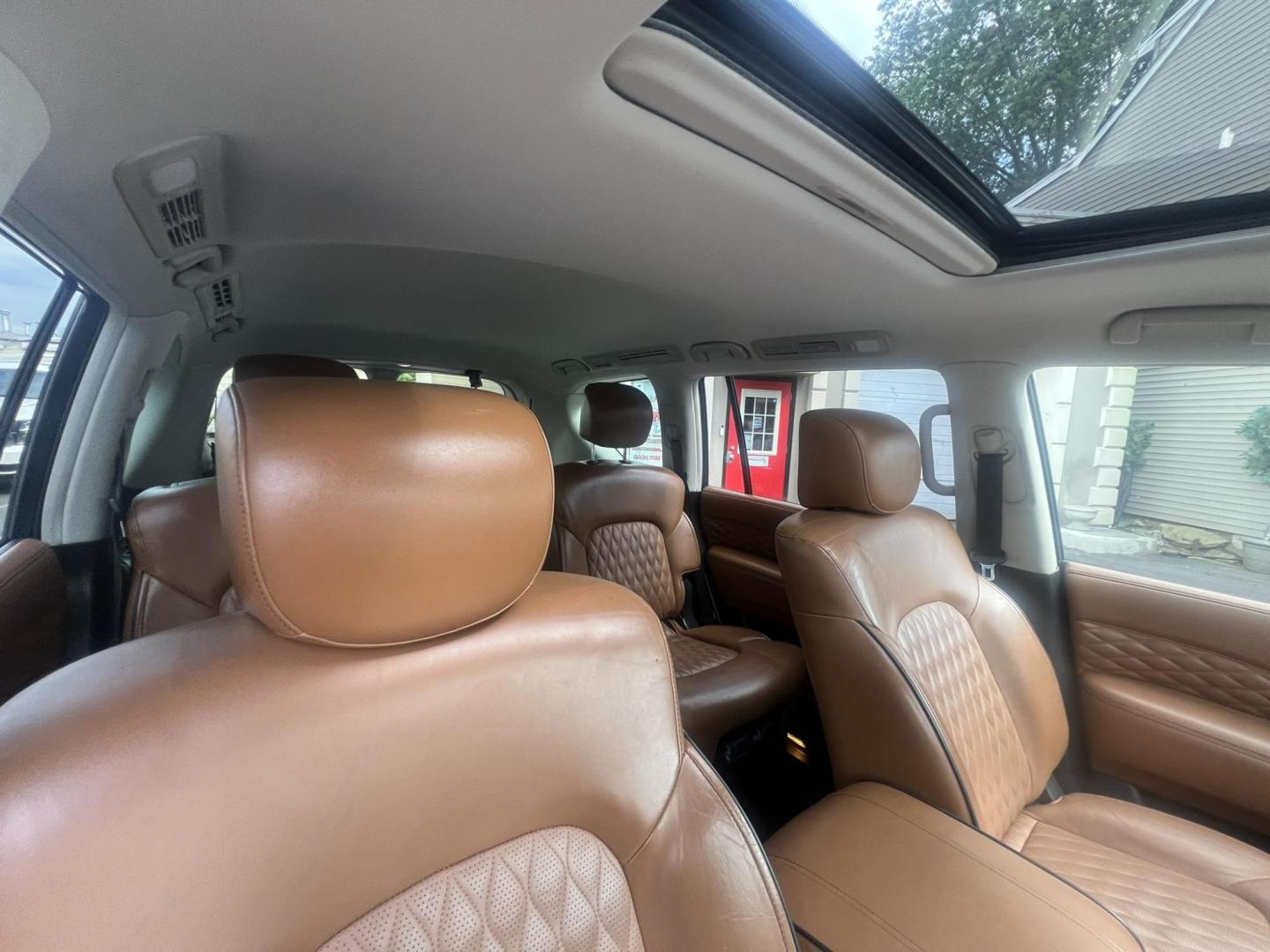 2018 BLACK /Tan Leather Infiniti QX80 4WD (JN8AZ2NE1J9) with an 5.6L V8 DOHC 32V engine, 7A transmission, located at 1018 Brunswick Ave, Trenton, NJ, 08638, (609) 989-0900, 40.240086, -74.748085 - Photo#24