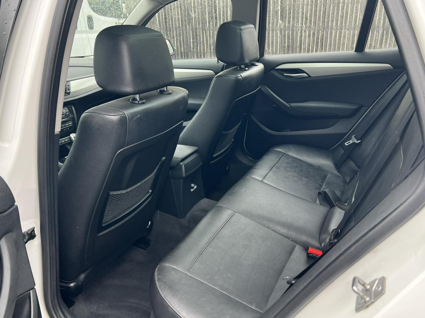 2014 White /Black Leather BMW X1 xDrive28i (WBAVL1C55EV) with an 2.0L L4 DOHC 16V engine, 8-Speed Automatic transmission, located at 1018 Brunswick Ave, Trenton, NJ, 08638, (609) 989-0900, 40.240086, -74.748085 - Photo#8