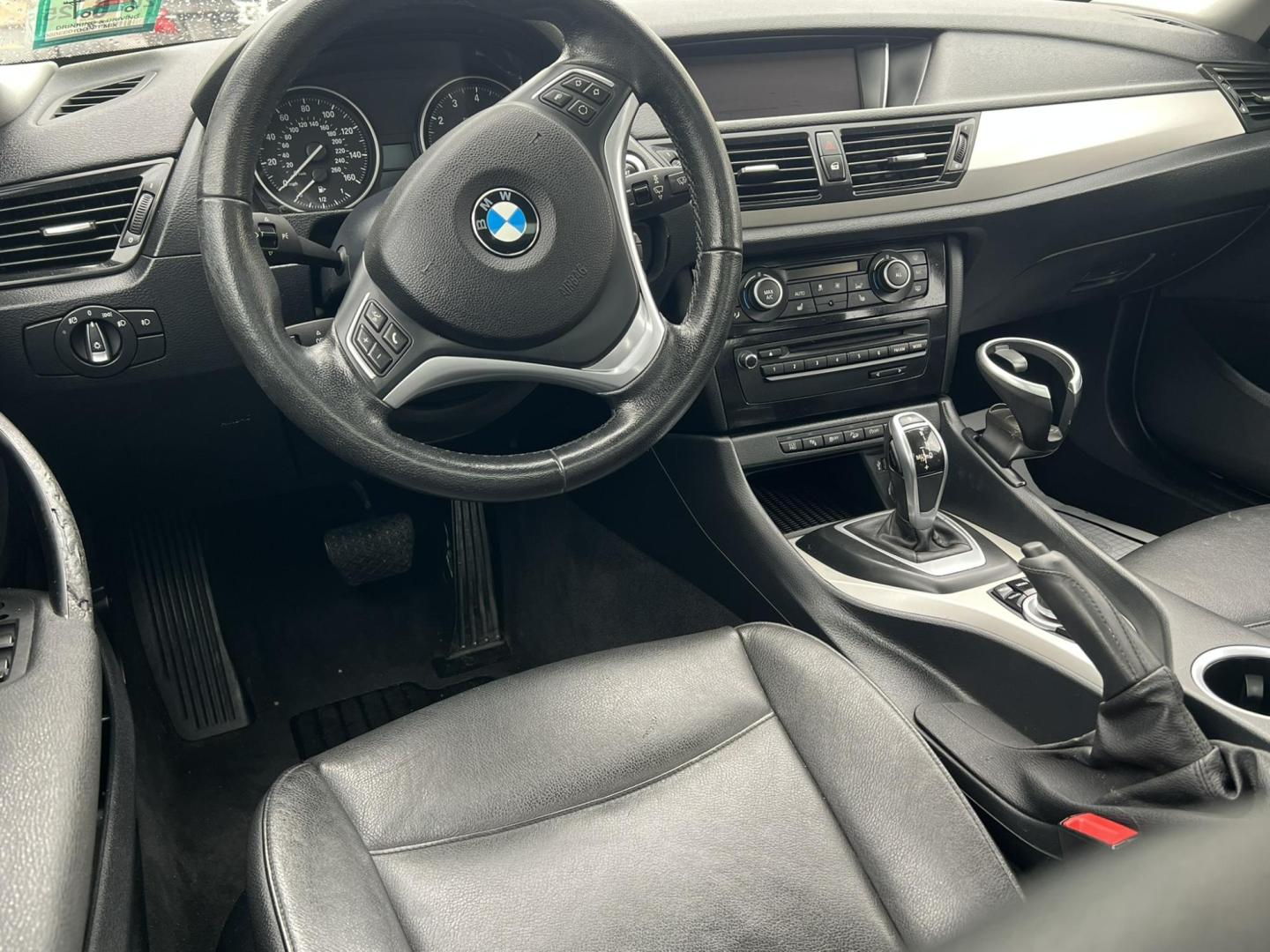 2014 White /Black Leather BMW X1 xDrive28i (WBAVL1C55EV) with an 2.0L L4 DOHC 16V engine, 8-Speed Automatic transmission, located at 1018 Brunswick Ave, Trenton, NJ, 08638, (609) 989-0900, 40.240086, -74.748085 - Photo#9