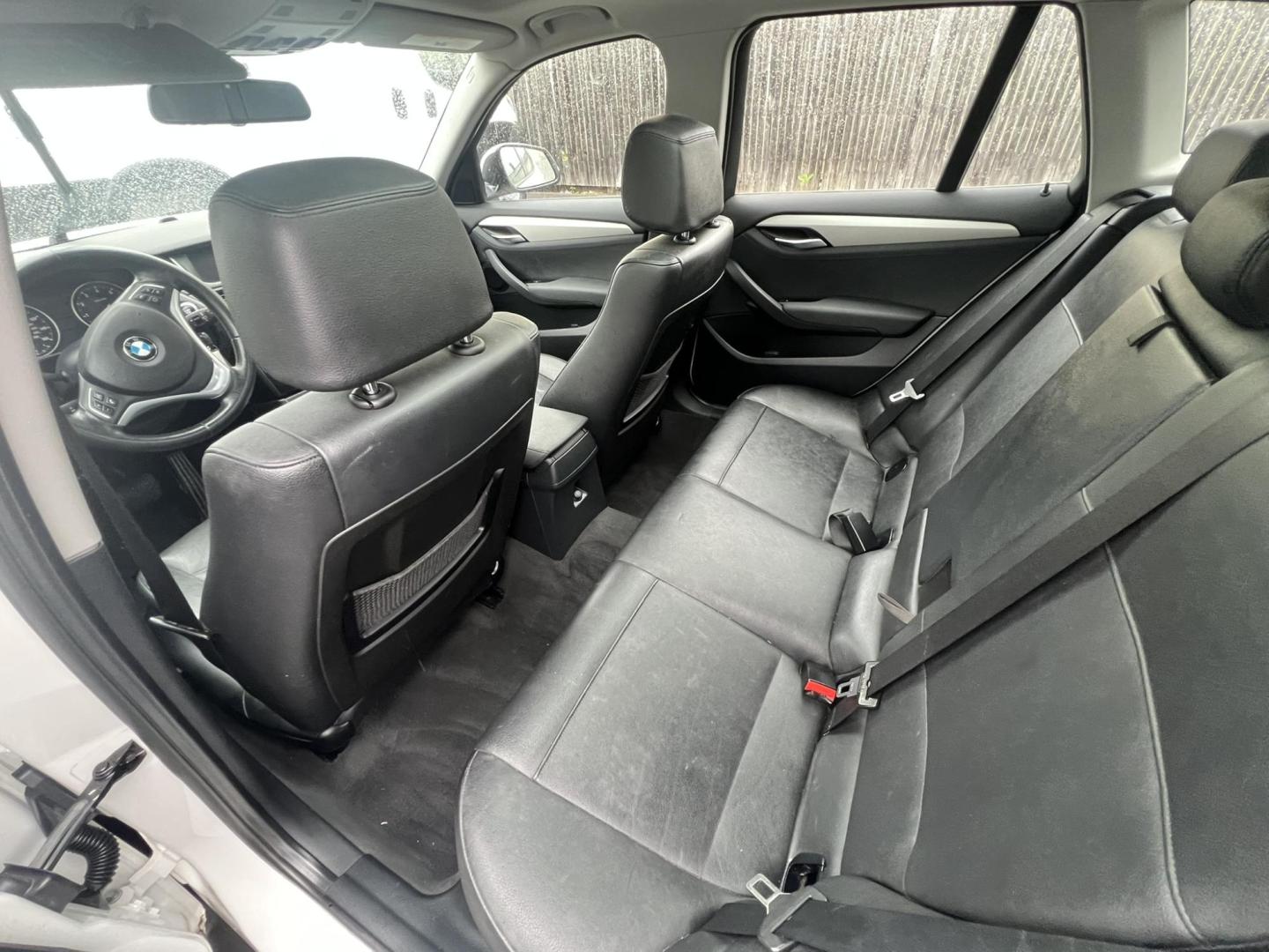 2014 White /Black Leather BMW X1 xDrive28i (WBAVL1C55EV) with an 2.0L L4 DOHC 16V engine, 8-Speed Automatic transmission, located at 1018 Brunswick Ave, Trenton, NJ, 08638, (609) 989-0900, 40.240086, -74.748085 - Photo#11
