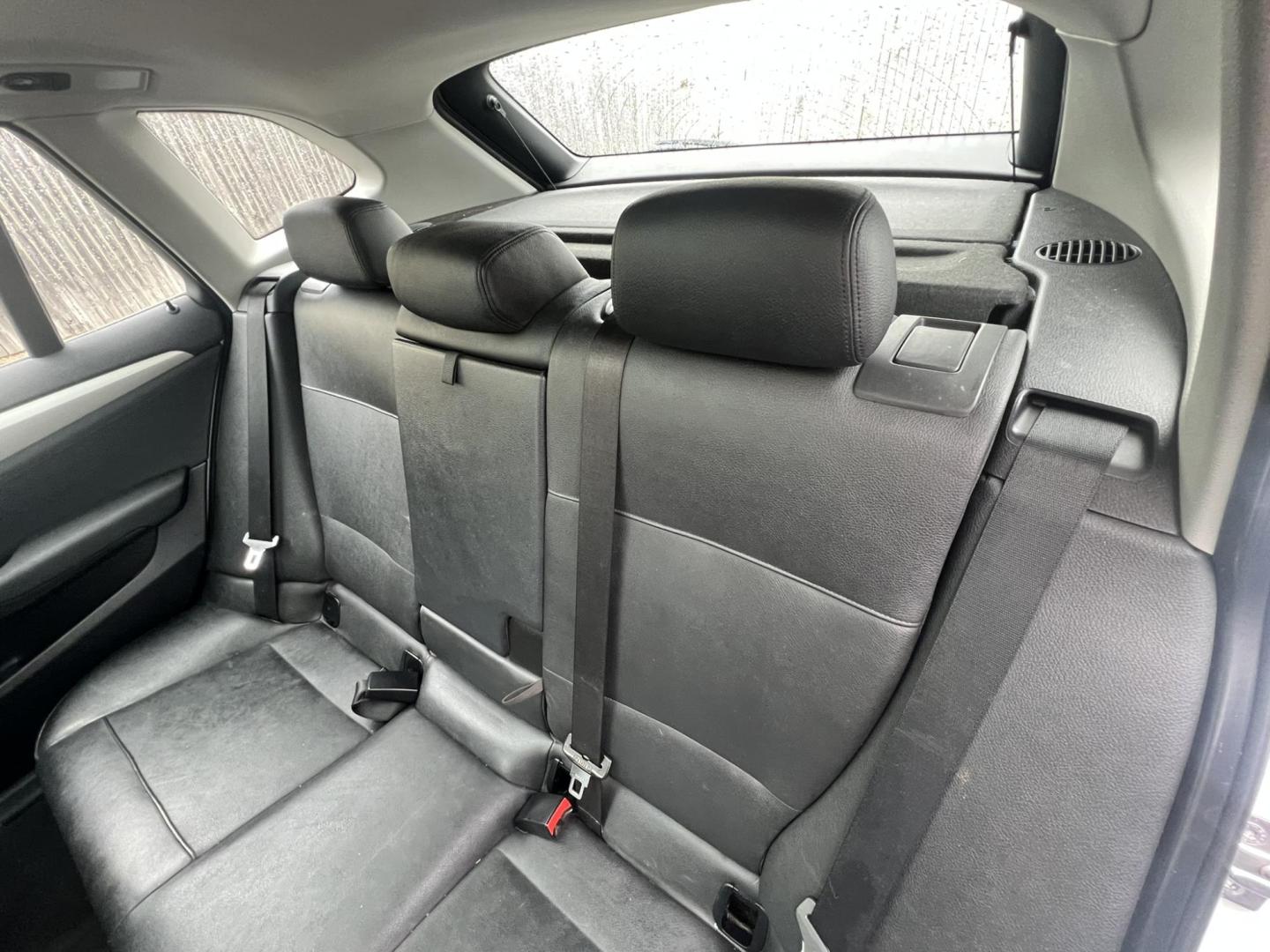 2014 White /Black Leather BMW X1 xDrive28i (WBAVL1C55EV) with an 2.0L L4 DOHC 16V engine, 8-Speed Automatic transmission, located at 1018 Brunswick Ave, Trenton, NJ, 08638, (609) 989-0900, 40.240086, -74.748085 - Photo#12