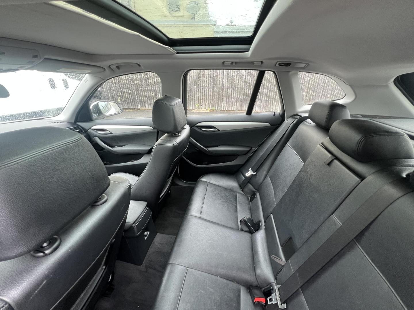2014 White /Black Leather BMW X1 xDrive28i (WBAVL1C55EV) with an 2.0L L4 DOHC 16V engine, 8-Speed Automatic transmission, located at 1018 Brunswick Ave, Trenton, NJ, 08638, (609) 989-0900, 40.240086, -74.748085 - Photo#13