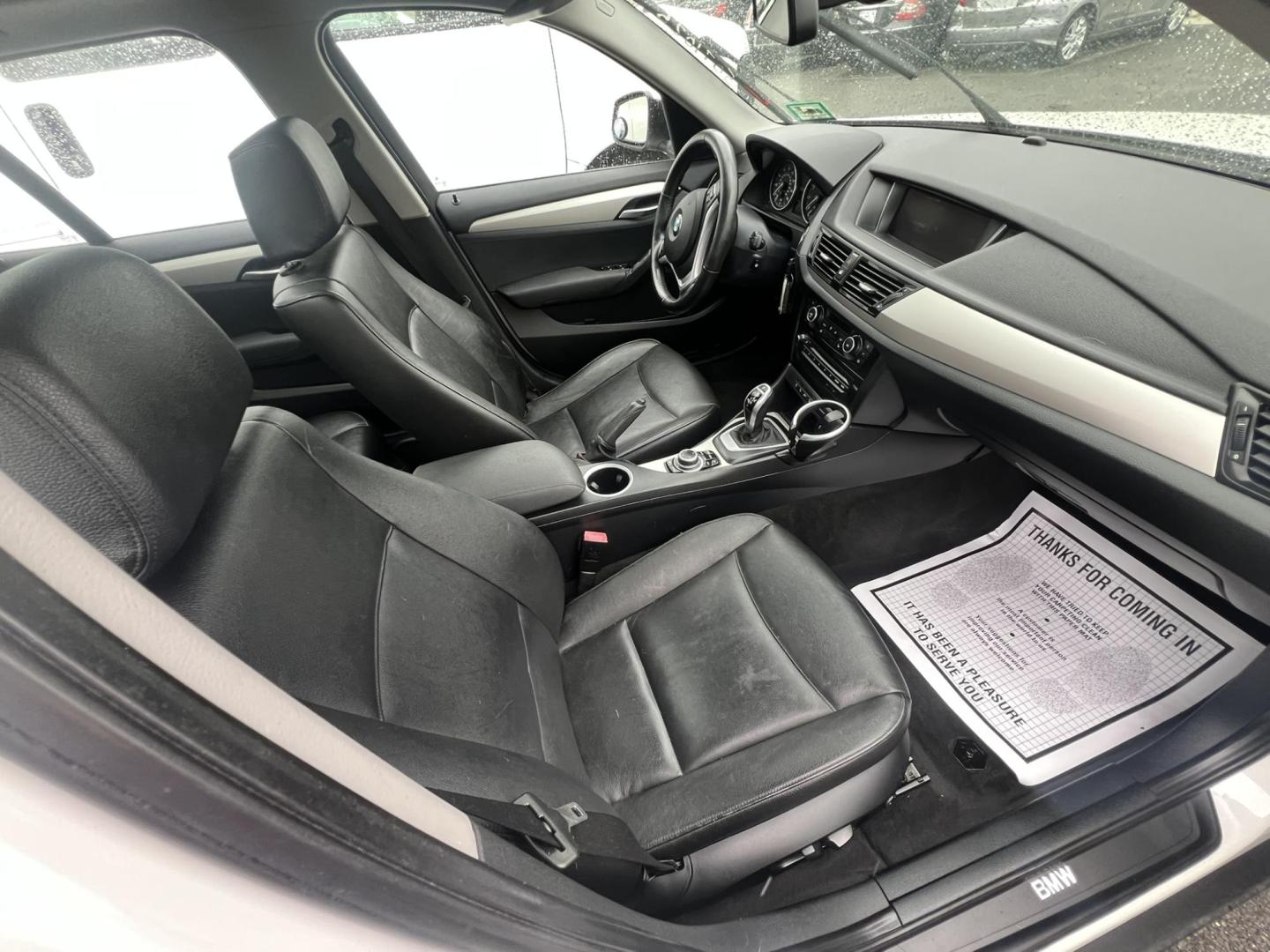 2014 White /Black Leather BMW X1 xDrive28i (WBAVL1C55EV) with an 2.0L L4 DOHC 16V engine, 8-Speed Automatic transmission, located at 1018 Brunswick Ave, Trenton, NJ, 08638, (609) 989-0900, 40.240086, -74.748085 - Photo#15