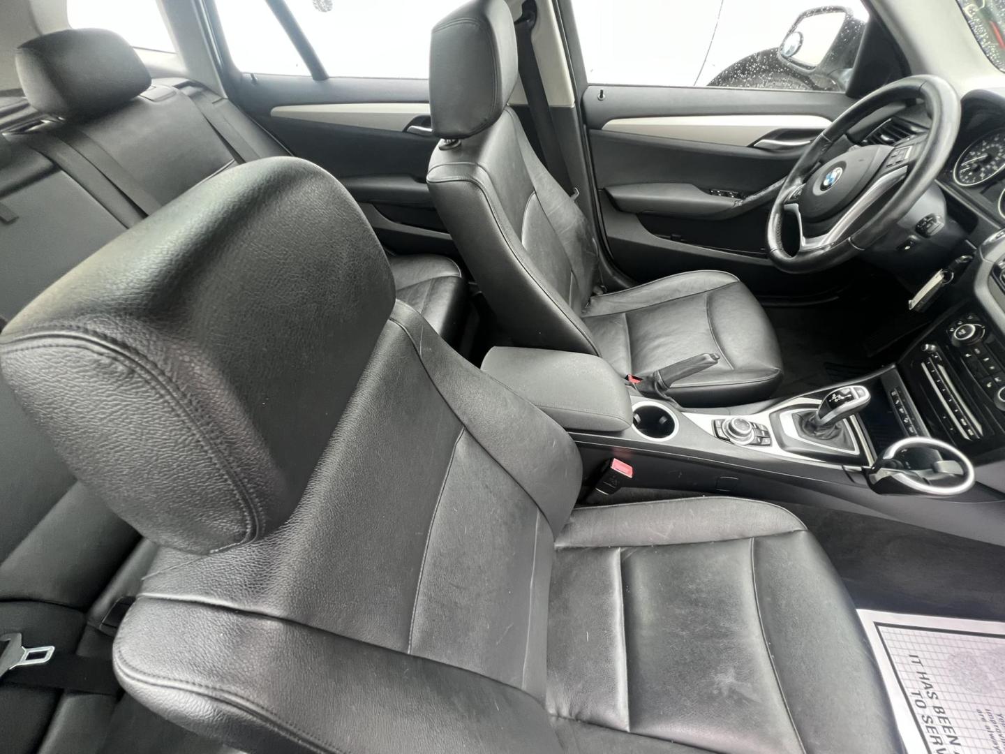 2014 White /Black Leather BMW X1 xDrive28i (WBAVL1C55EV) with an 2.0L L4 DOHC 16V engine, 8-Speed Automatic transmission, located at 1018 Brunswick Ave, Trenton, NJ, 08638, (609) 989-0900, 40.240086, -74.748085 - Photo#18