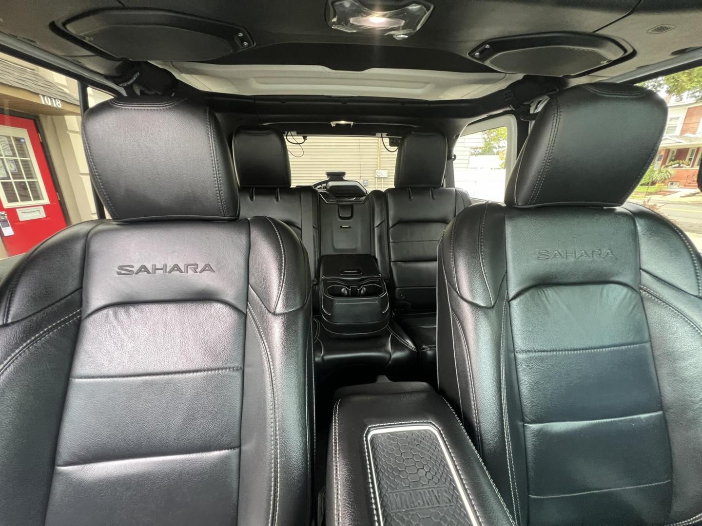 2018 White /Black Leather Jeep Wrangler Unlimited Sahara (1C4HJXENXJW) with an 2.0L L4 DOHC 16V TURBO engine, 6A transmission, located at 1018 Brunswick Ave, Trenton, NJ, 08638, (609) 989-0900, 40.240086, -74.748085 - Photo#8