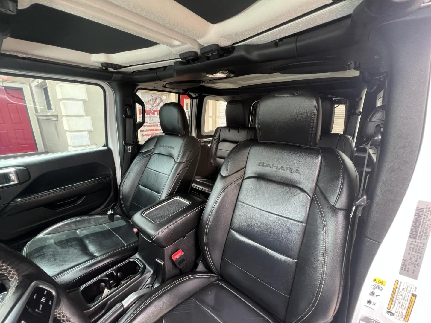 2018 White /Black Leather Jeep Wrangler Unlimited Sahara (1C4HJXENXJW) with an 2.0L L4 DOHC 16V TURBO engine, 6A transmission, located at 1018 Brunswick Ave, Trenton, NJ, 08638, (609) 989-0900, 40.240086, -74.748085 - Photo#12