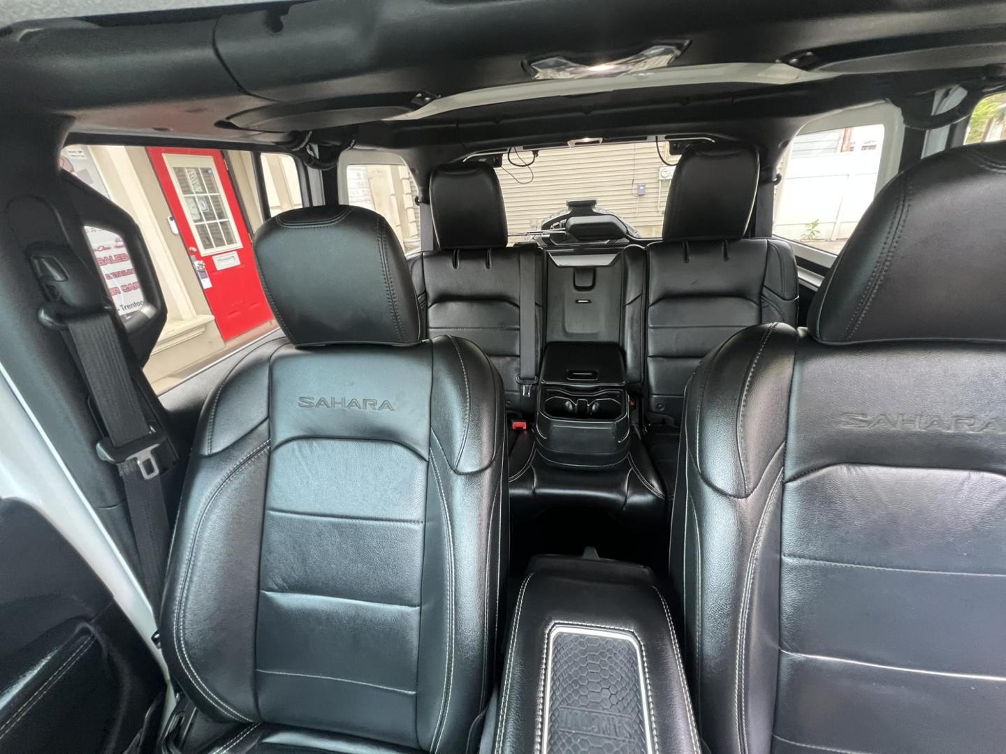 2018 White /Black Leather Jeep Wrangler Unlimited Sahara (1C4HJXENXJW) with an 2.0L L4 DOHC 16V TURBO engine, 6A transmission, located at 1018 Brunswick Ave, Trenton, NJ, 08638, (609) 989-0900, 40.240086, -74.748085 - Photo#13