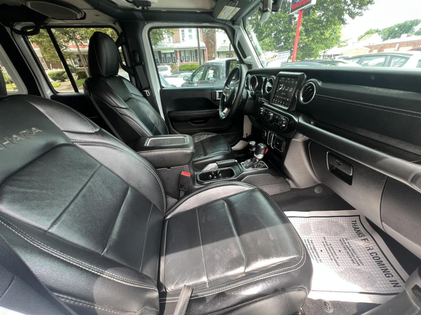 2018 White /Black Leather Jeep Wrangler Unlimited Sahara (1C4HJXENXJW) with an 2.0L L4 DOHC 16V TURBO engine, 6A transmission, located at 1018 Brunswick Ave, Trenton, NJ, 08638, (609) 989-0900, 40.240086, -74.748085 - Photo#27