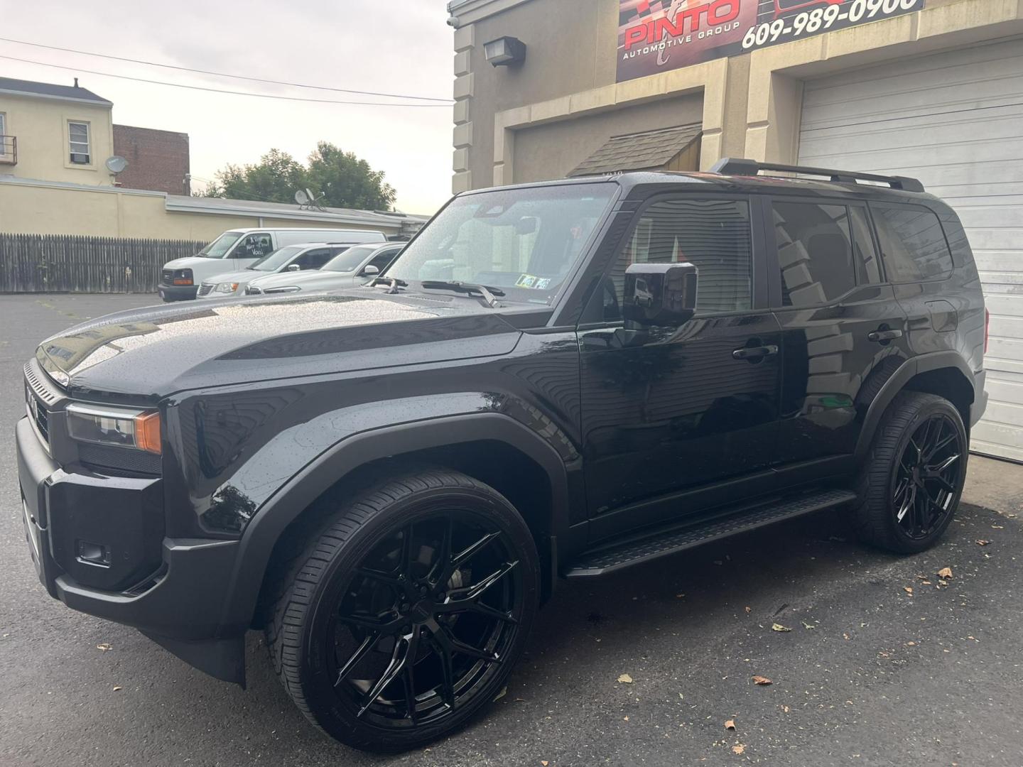2024 BLACK /Black Leather Toyota Land Cruiser Base (JTEABFAJ7RK) with an 2.4L L4 DOHC 16V PLUG-IN HYBRID engine, 8A transmission, located at 1018 Brunswick Ave, Trenton, NJ, 08638, (609) 989-0900, 40.240086, -74.748085 - Wow! Wow! Wow! Here is a super rare Black Beauty w custom 24" Vossen Wheels to complete a Great Look and Stance for this Landcruiser!! An absolute one of a kind in every way! Please call Anthony to set up an appt. to see and drive this Stunning Toyota. 609-273-5100 - Photo#2