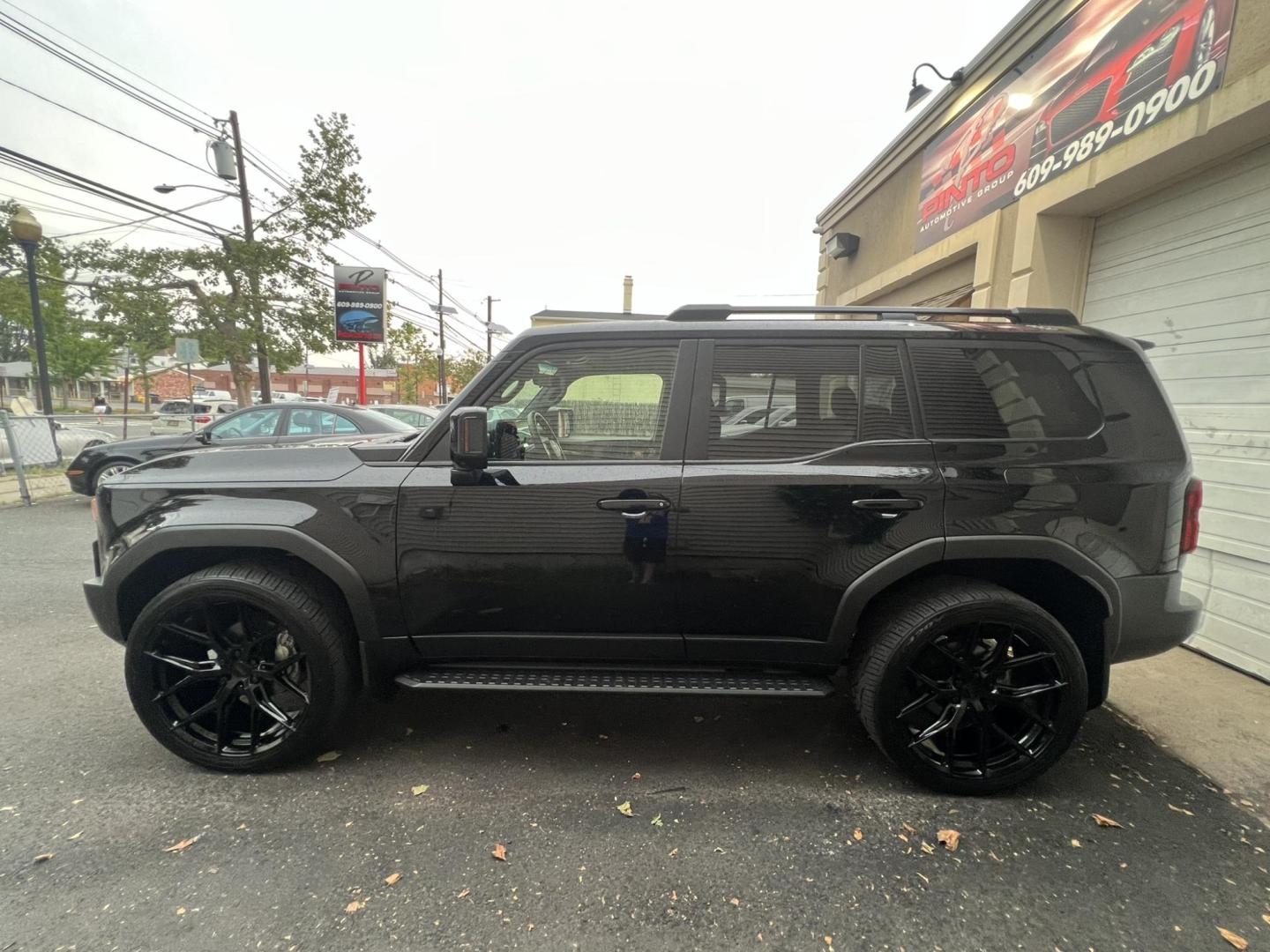 2024 BLACK /Black Leather Toyota Land Cruiser Base (JTEABFAJ7RK) with an 2.4L L4 DOHC 16V PLUG-IN HYBRID engine, 8A transmission, located at 1018 Brunswick Ave, Trenton, NJ, 08638, (609) 989-0900, 40.240086, -74.748085 - Wow! Wow! Wow! Here is a super rare Black Beauty w custom 24" Vossen Wheels to complete a Great Look and Stance for this Landcruiser!! An absolute one of a kind in every way! Please call Anthony to set up an appt. to see and drive this Stunning Toyota. 609-273-5100 - Photo#1