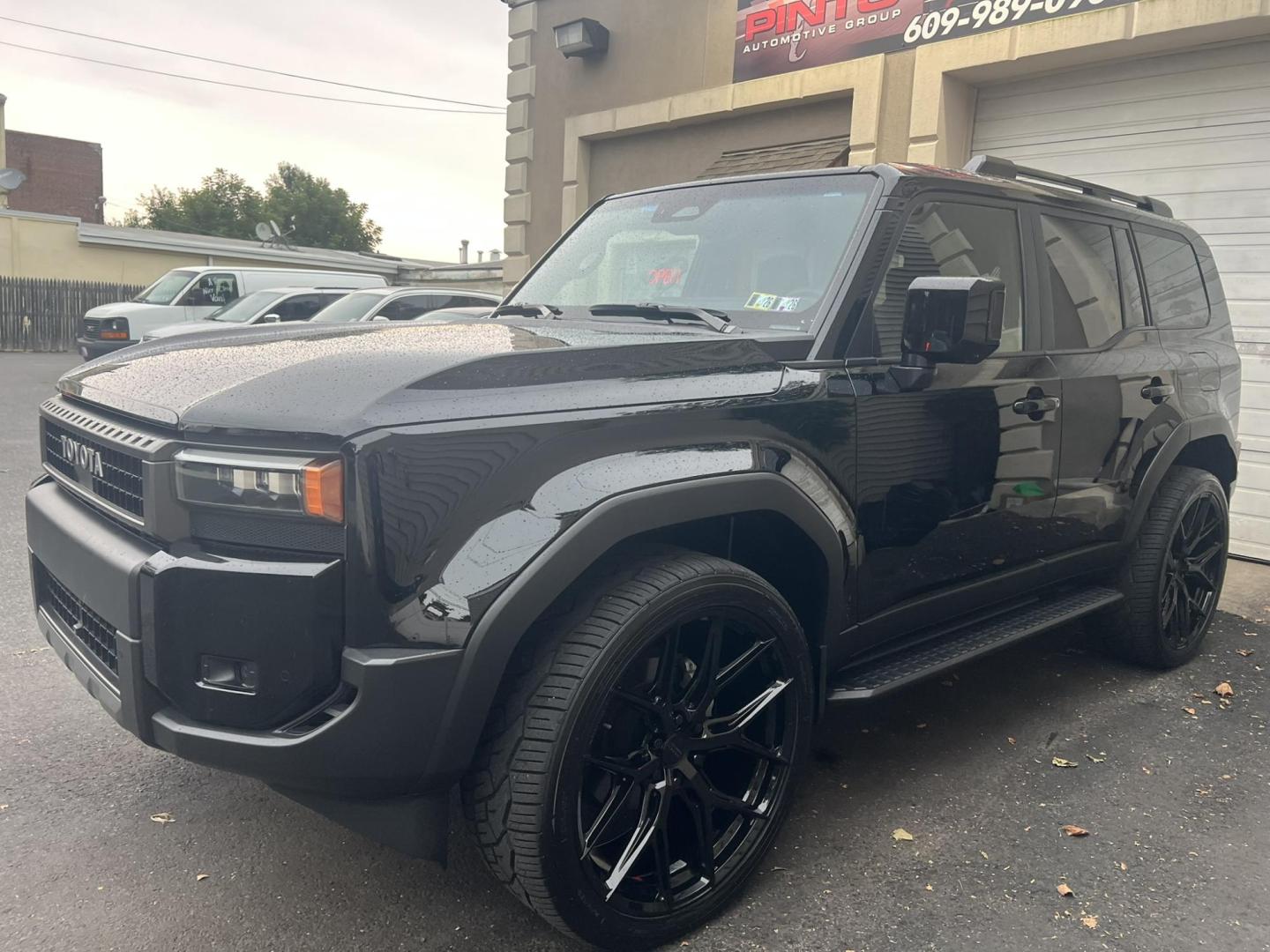 2024 BLACK /Black Leather Toyota Land Cruiser Base (JTEABFAJ7RK) with an 2.4L L4 DOHC 16V PLUG-IN HYBRID engine, 8A transmission, located at 1018 Brunswick Ave, Trenton, NJ, 08638, (609) 989-0900, 40.240086, -74.748085 - Wow! Wow! Wow! Here is a super rare Black Beauty w custom 24" Vossen Wheels to complete a Great Look and Stance for this Landcruiser!! An absolute one of a kind in every way! Please call Anthony to set up an appt. to see and drive this Stunning Toyota. 609-273-5100 - Photo#3