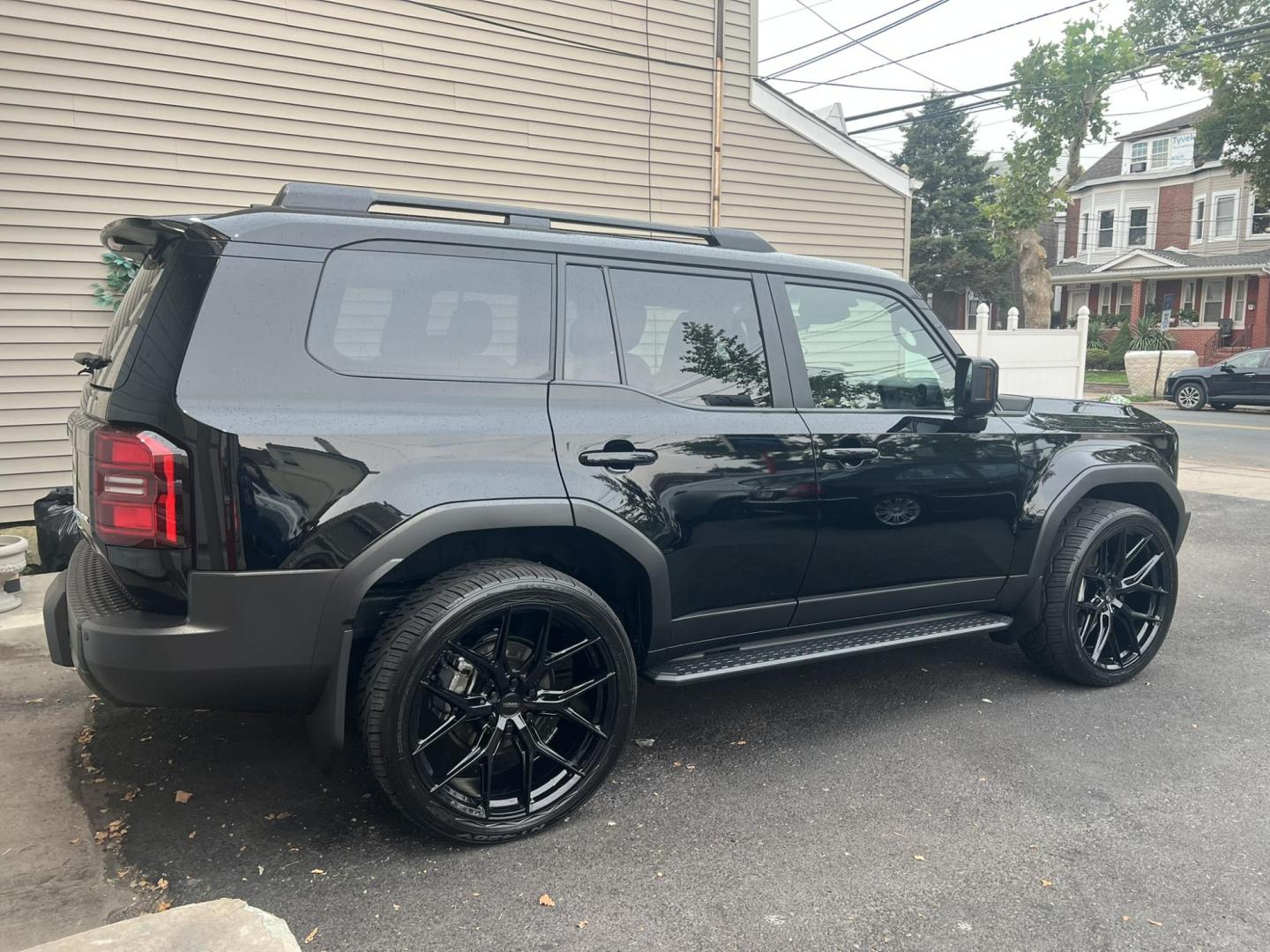 2024 BLACK /Black Leather Toyota Land Cruiser Base (JTEABFAJ7RK) with an 2.4L L4 DOHC 16V PLUG-IN HYBRID engine, 8A transmission, located at 1018 Brunswick Ave, Trenton, NJ, 08638, (609) 989-0900, 40.240086, -74.748085 - Wow! Wow! Wow! Here is a super rare Black Beauty w custom 24" Vossen Wheels to complete a Great Look and Stance for this Landcruiser!! An absolute one of a kind in every way! Please call Anthony to set up an appt. to see and drive this Stunning Toyota. 609-273-5100 - Photo#7