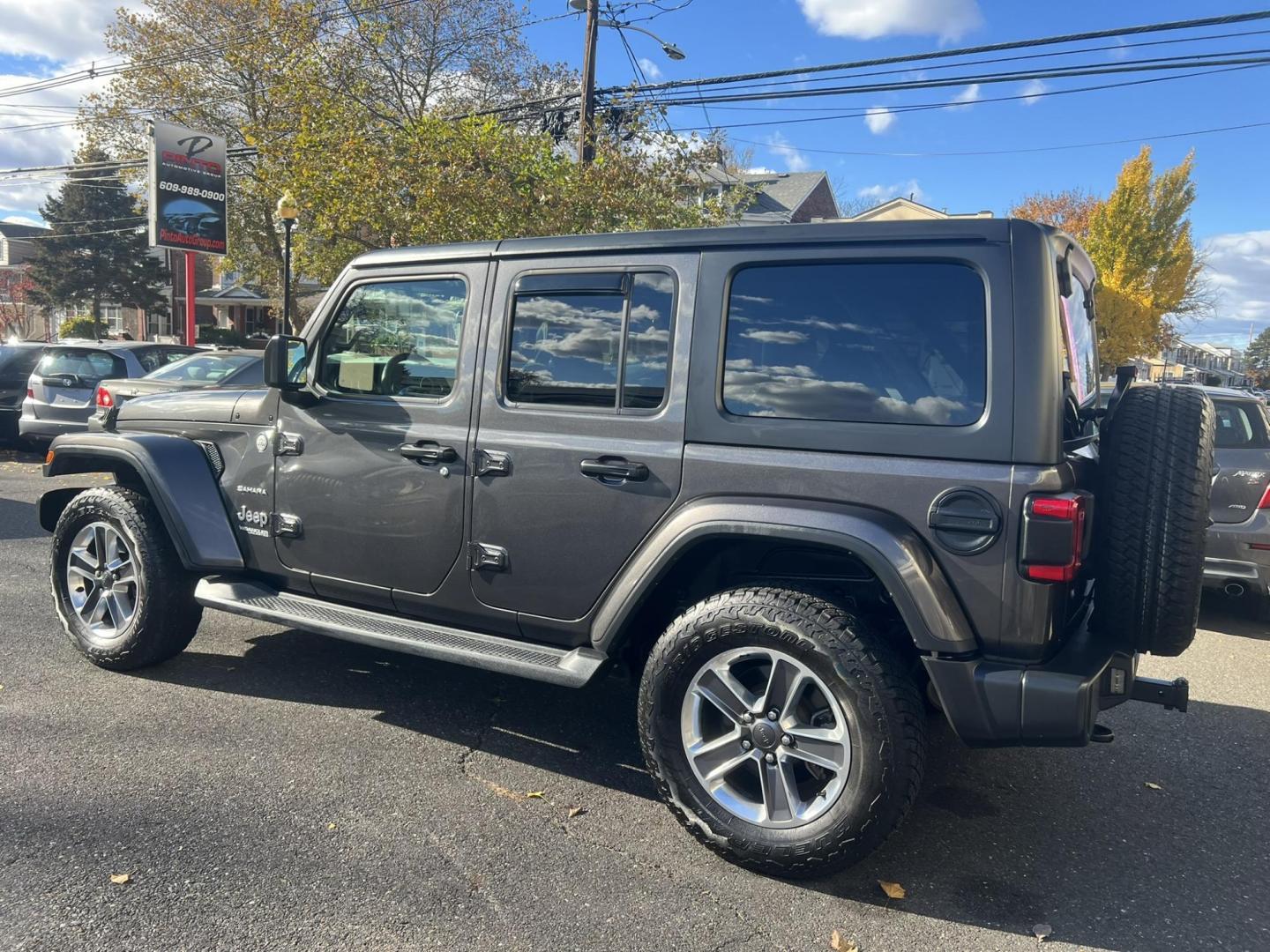 2019 GRAY /Black Jeep Wrangler Unlimited Sahara (1C4HJXEN1KW) with an 2.0L L4 DOHC 16V TURBO engine, 6A transmission, located at 1018 Brunswick Ave, Trenton, NJ, 08638, (609) 989-0900, 40.240086, -74.748085 - Wow! This Sahara is loaded up with great options and a great color combo! Just serviced up and looks and runs like brand new! A must see and drive ASAP while it lasts! Please call Anthony to set up an appt. to see it, 609-273-5100. Financing available!! - Photo#1