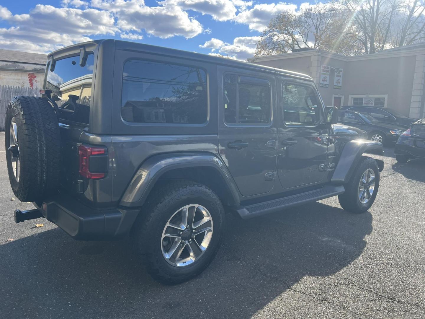 2019 GRAY /Black Jeep Wrangler Unlimited Sahara (1C4HJXEN1KW) with an 2.0L L4 DOHC 16V TURBO engine, 6A transmission, located at 1018 Brunswick Ave, Trenton, NJ, 08638, (609) 989-0900, 40.240086, -74.748085 - Wow! This Sahara is loaded up with great options and a great color combo! Just serviced up and looks and runs like brand new! A must see and drive ASAP while it lasts! Please call Anthony to set up an appt. to see it, 609-273-5100. Financing available!! - Photo#3