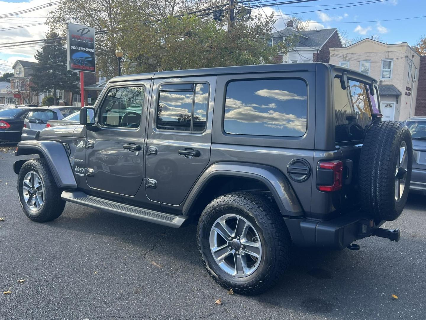2019 GRAY /Black Jeep Wrangler Unlimited Sahara (1C4HJXEN1KW) with an 2.0L L4 DOHC 16V TURBO engine, 6A transmission, located at 1018 Brunswick Ave, Trenton, NJ, 08638, (609) 989-0900, 40.240086, -74.748085 - Wow! This Sahara is loaded up with great options and a great color combo! Just serviced up and looks and runs like brand new! A must see and drive ASAP while it lasts! Please call Anthony to set up an appt. to see it, 609-273-5100. Financing available!! - Photo#5