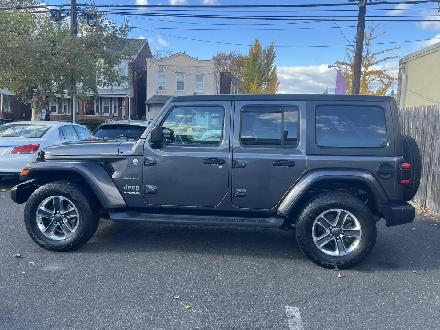 2019 GRAY /Black Jeep Wrangler Unlimited Sahara (1C4HJXEN1KW) with an 2.0L L4 DOHC 16V TURBO engine, 6A transmission, located at 1018 Brunswick Ave, Trenton, NJ, 08638, (609) 989-0900, 40.240086, -74.748085 - Wow! This Sahara is loaded up with great options and a great color combo! Just serviced up and looks and runs like brand new! A must see and drive ASAP while it lasts! Please call Anthony to set up an appt. to see it, 609-273-5100. Financing available!! - Photo#4