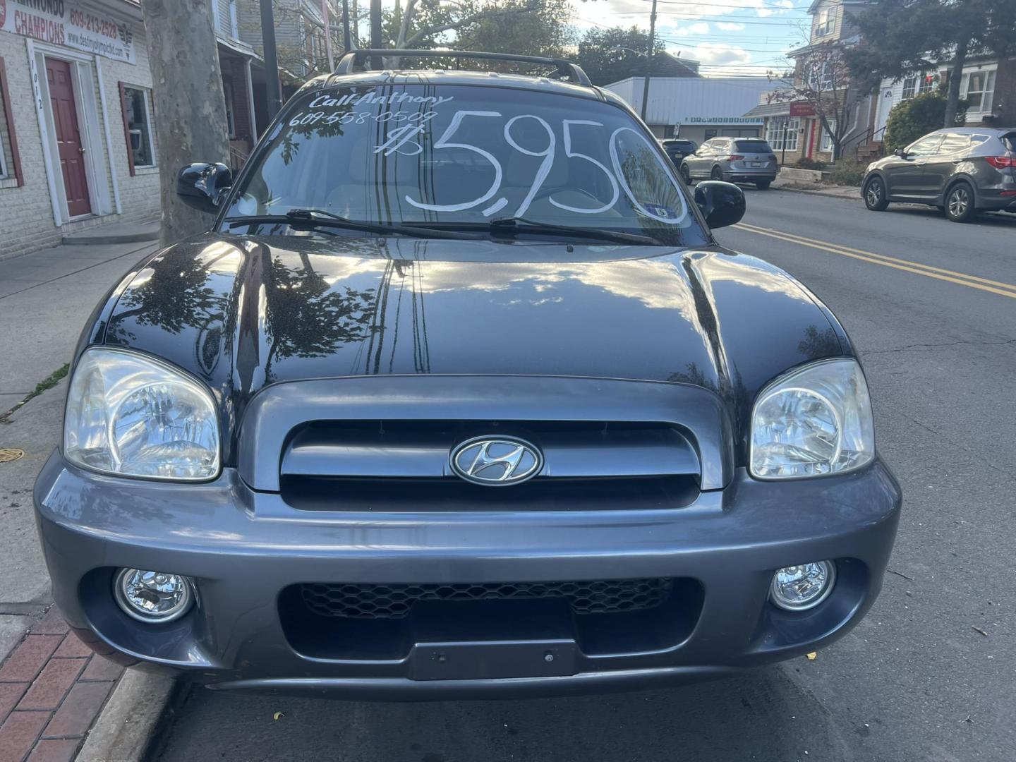 2005 BLACK Hyundai Santa Fe GLS 2.7L (KM8SC13DX5U) with an 2.7L V6 DOHC 24V engine, 4-Speed Automatic Overdrive transmission, located at 1018 Brunswick Ave, Trenton, NJ, 08638, (609) 989-0900, 40.240086, -74.748085 - Well< here is a super clean, one owner serviced up Hyundai SUV! This vehicle is like new in every way, an absolute must see and drive ASAP! Please call Anthony to set up an appt. 6092735100 - Photo#1
