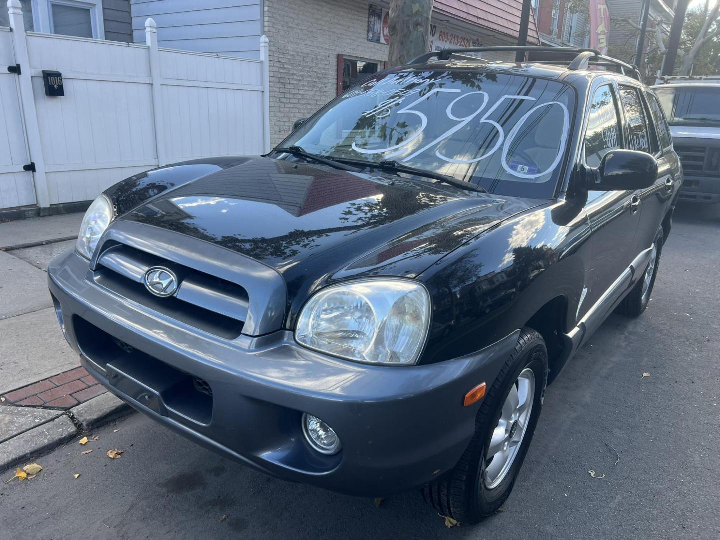 2005 BLACK Hyundai Santa Fe GLS 2.7L (KM8SC13DX5U) with an 2.7L V6 DOHC 24V engine, 4-Speed Automatic Overdrive transmission, located at 1018 Brunswick Ave, Trenton, NJ, 08638, (609) 989-0900, 40.240086, -74.748085 - Well< here is a super clean, one owner serviced up Hyundai SUV! This vehicle is like new in every way, an absolute must see and drive ASAP! Please call Anthony to set up an appt. 6092735100 - Photo#6