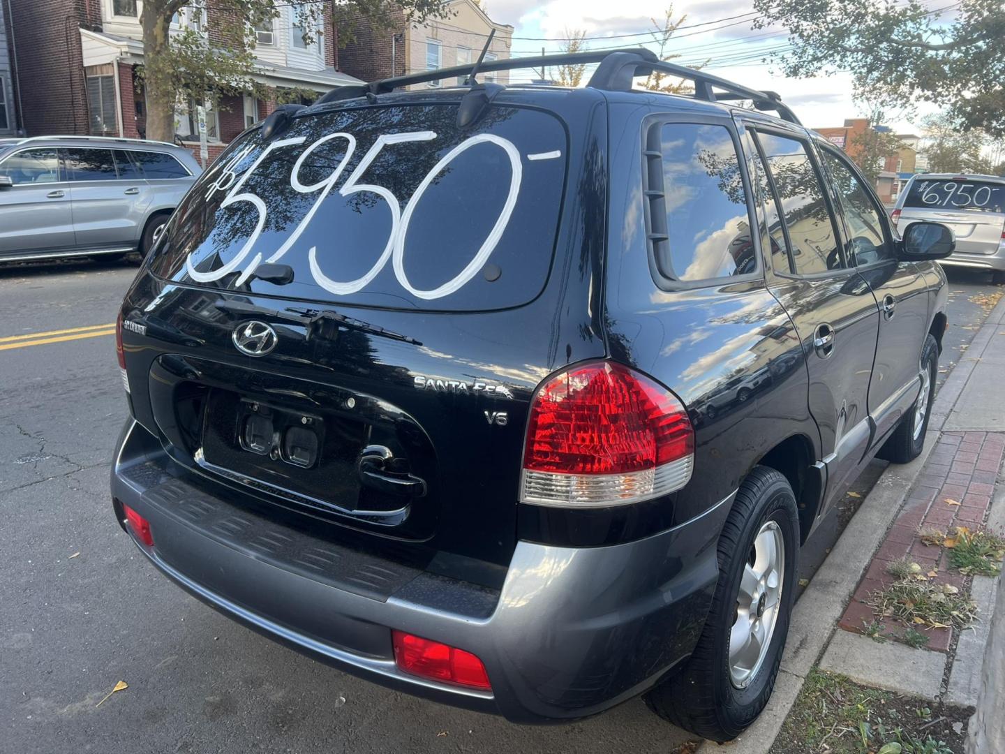 2005 BLACK Hyundai Santa Fe GLS 2.7L (KM8SC13DX5U) with an 2.7L V6 DOHC 24V engine, 4-Speed Automatic Overdrive transmission, located at 1018 Brunswick Ave, Trenton, NJ, 08638, (609) 989-0900, 40.240086, -74.748085 - Well< here is a super clean, one owner serviced up Hyundai SUV! This vehicle is like new in every way, an absolute must see and drive ASAP! Please call Anthony to set up an appt. 6092735100 - Photo#7