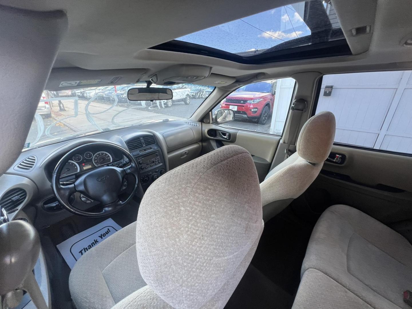 2005 BLACK Hyundai Santa Fe GLS 2.7L (KM8SC13DX5U) with an 2.7L V6 DOHC 24V engine, 4-Speed Automatic Overdrive transmission, located at 1018 Brunswick Ave, Trenton, NJ, 08638, (609) 989-0900, 40.240086, -74.748085 - Well< here is a super clean, one owner serviced up Hyundai SUV! This vehicle is like new in every way, an absolute must see and drive ASAP! Please call Anthony to set up an appt. 6092735100 - Photo#10