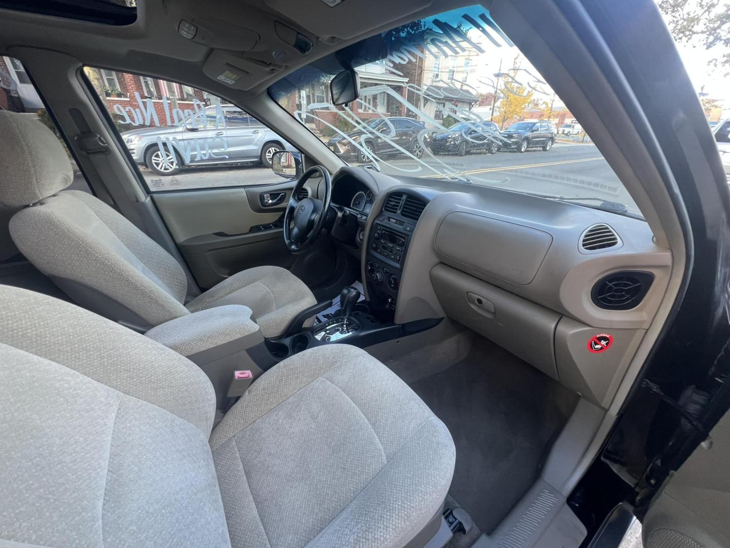 2005 BLACK Hyundai Santa Fe GLS 2.7L (KM8SC13DX5U) with an 2.7L V6 DOHC 24V engine, 4-Speed Automatic Overdrive transmission, located at 1018 Brunswick Ave, Trenton, NJ, 08638, (609) 989-0900, 40.240086, -74.748085 - Well< here is a super clean, one owner serviced up Hyundai SUV! This vehicle is like new in every way, an absolute must see and drive ASAP! Please call Anthony to set up an appt. 6092735100 - Photo#13