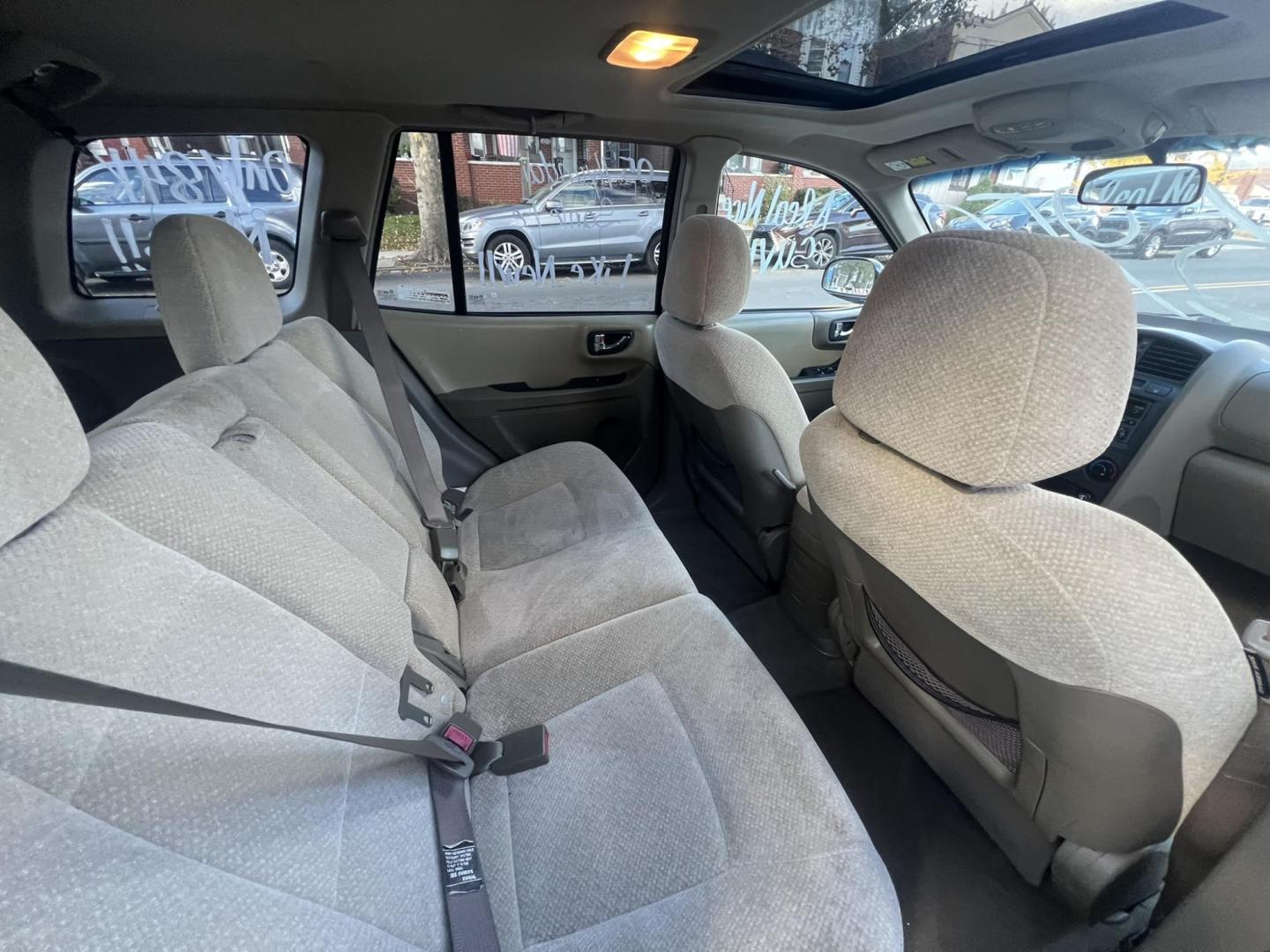 2005 BLACK Hyundai Santa Fe GLS 2.7L (KM8SC13DX5U) with an 2.7L V6 DOHC 24V engine, 4-Speed Automatic Overdrive transmission, located at 1018 Brunswick Ave, Trenton, NJ, 08638, (609) 989-0900, 40.240086, -74.748085 - Well< here is a super clean, one owner serviced up Hyundai SUV! This vehicle is like new in every way, an absolute must see and drive ASAP! Please call Anthony to set up an appt. 6092735100 - Photo#16