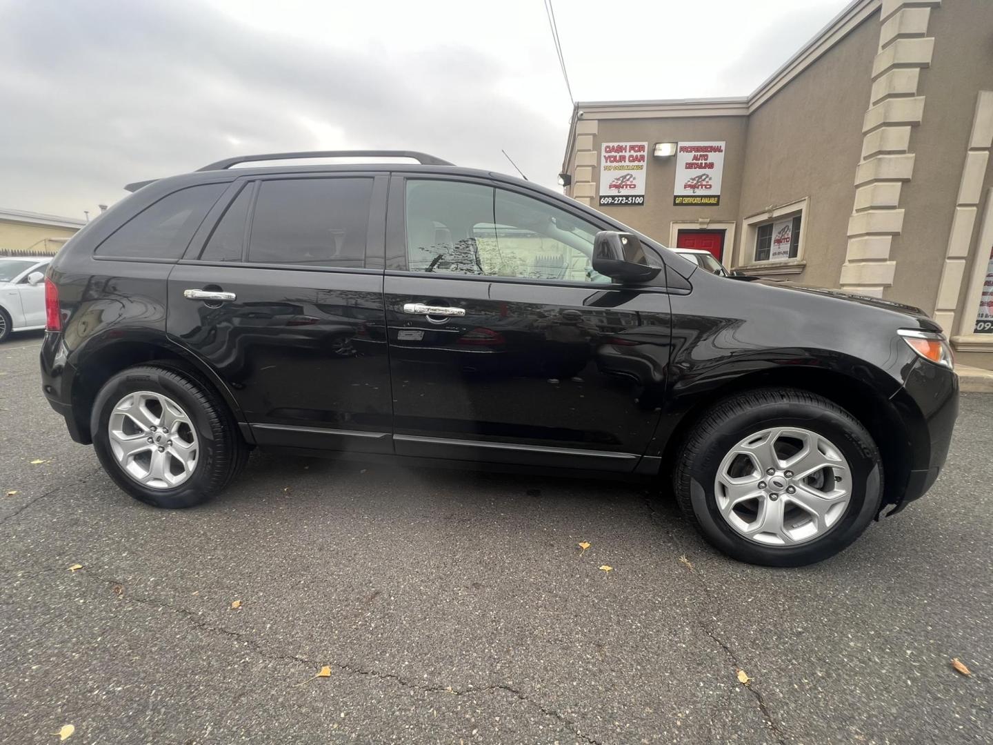 2011 BLACK /Gray Ford Edge SEL FWD (2FMDK3JC0BB) with an 3.5L V6 DOHC 24V engine, 6-Speed Automatic transmission, located at 1018 Brunswick Ave, Trenton, NJ, 08638, (609) 989-0900, 40.240086, -74.748085 - Looking for a clean and well kept SUV? This is it right here, all serviced up and ready to go! Please call Anthony to set up an appt. 609-273-5100 - Photo#1