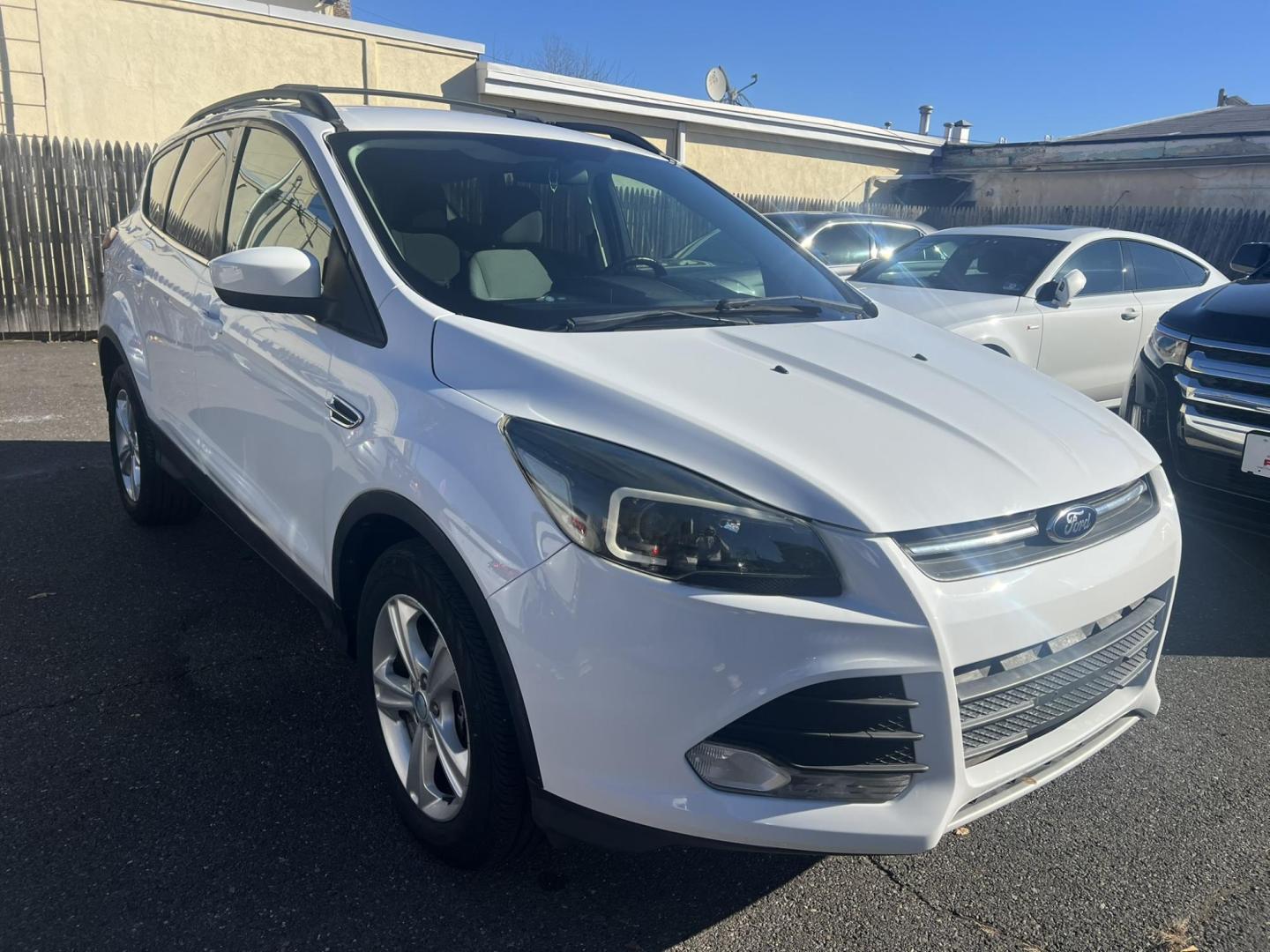 2013 White Ford Escape SE AWD (1FMCU9GXXDU) with an 1.6L L4 DOHC 16V engine, 6-Speed Automatic transmission, located at 1018 Brunswick Ave, Trenton, NJ, 08638, (609) 989-0900, 40.240086, -74.748085 - Photo#0