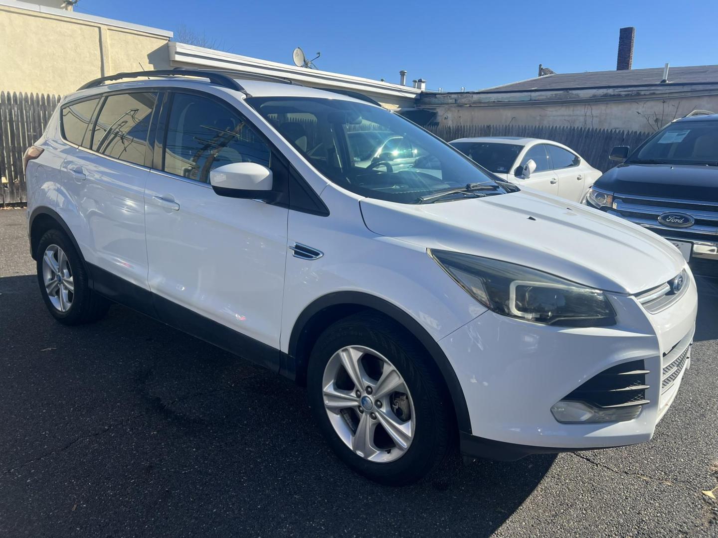 2013 White Ford Escape SE AWD (1FMCU9GXXDU) with an 1.6L L4 DOHC 16V engine, 6-Speed Automatic transmission, located at 1018 Brunswick Ave, Trenton, NJ, 08638, (609) 989-0900, 40.240086, -74.748085 - Photo#3