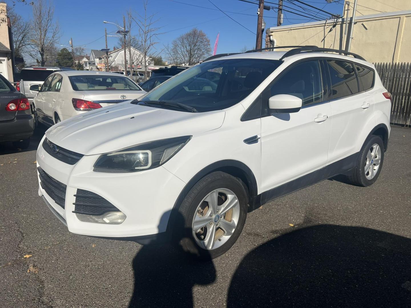2013 White Ford Escape SE AWD (1FMCU9GXXDU) with an 1.6L L4 DOHC 16V engine, 6-Speed Automatic transmission, located at 1018 Brunswick Ave, Trenton, NJ, 08638, (609) 989-0900, 40.240086, -74.748085 - Photo#1