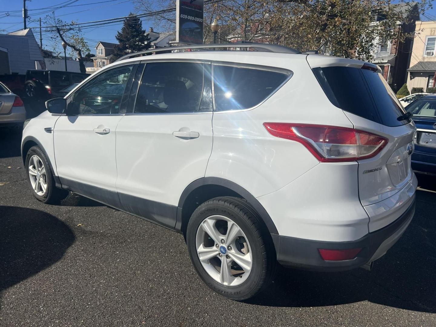 2013 White Ford Escape SE AWD (1FMCU9GXXDU) with an 1.6L L4 DOHC 16V engine, 6-Speed Automatic transmission, located at 1018 Brunswick Ave, Trenton, NJ, 08638, (609) 989-0900, 40.240086, -74.748085 - Photo#5