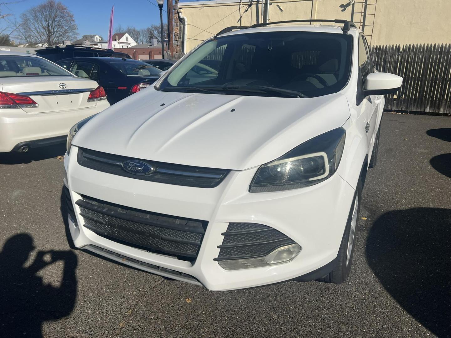 2013 White Ford Escape SE AWD (1FMCU9GXXDU) with an 1.6L L4 DOHC 16V engine, 6-Speed Automatic transmission, located at 1018 Brunswick Ave, Trenton, NJ, 08638, (609) 989-0900, 40.240086, -74.748085 - Photo#2
