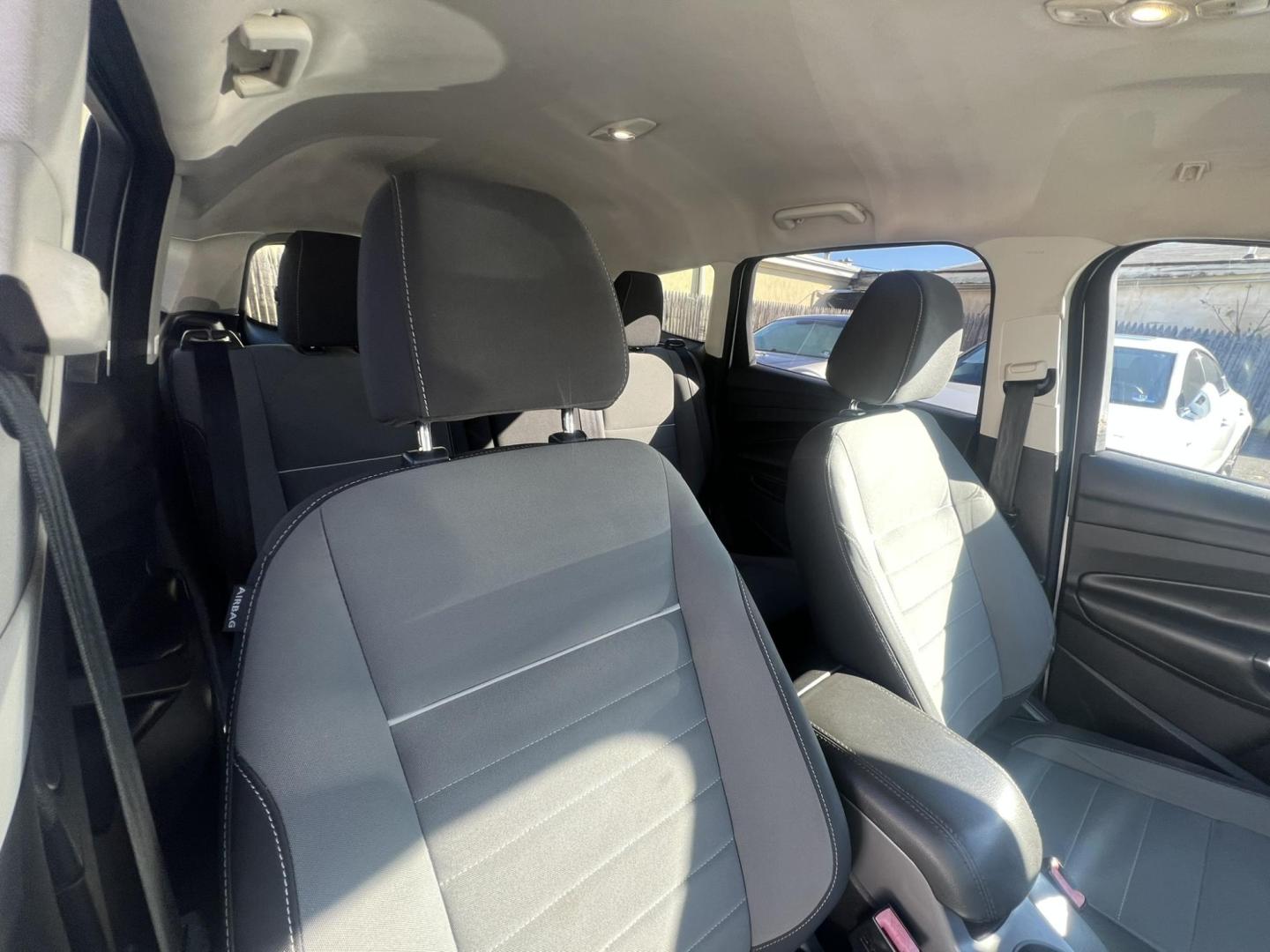 2013 White Ford Escape SE AWD (1FMCU9GXXDU) with an 1.6L L4 DOHC 16V engine, 6-Speed Automatic transmission, located at 1018 Brunswick Ave, Trenton, NJ, 08638, (609) 989-0900, 40.240086, -74.748085 - Photo#9