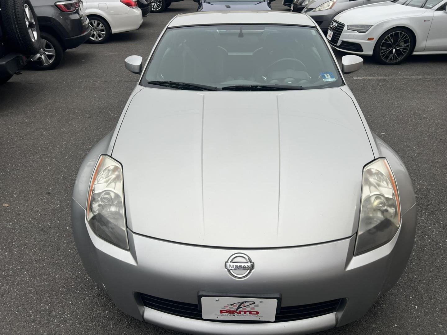 2003 SILVER /Black Nissan 350Z Base (JN1AZ34D93T) with an 3.5L V6 DOHC 24V engine, 6-Speed Manual Overdrive transmission, located at 1018 Brunswick Ave, Trenton, NJ, 08638, (609) 989-0900, 40.240086, -74.748085 - Wow! Yes that is correct, Only 37k miles on this like new 350z! Recently serviced and detailed, Ready for the next owner! This Nissan is like new in every way and a must see and drive to appreciate! Rare 6 speed manual transmission. Please call Anthony to set up an appointment-609-273-5100 - Photo#1