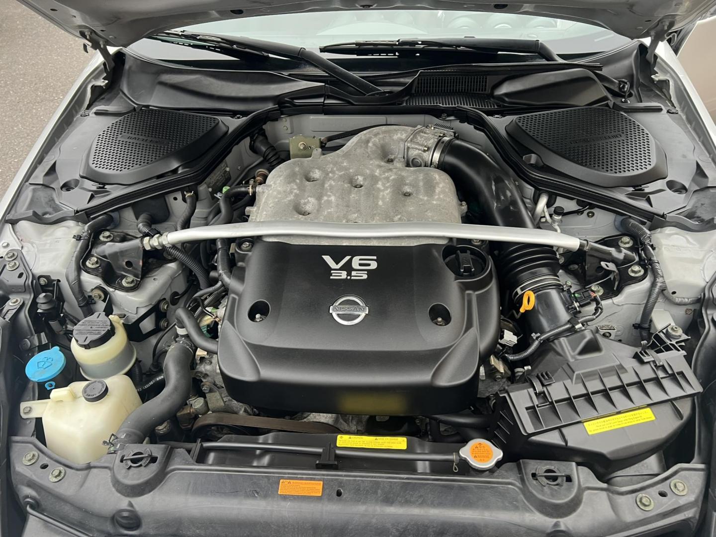 2003 SILVER /Black Nissan 350Z Base (JN1AZ34D93T) with an 3.5L V6 DOHC 24V engine, 6-Speed Manual Overdrive transmission, located at 1018 Brunswick Ave, Trenton, NJ, 08638, (609) 989-0900, 40.240086, -74.748085 - Wow! Yes that is correct, Only 37k miles on this like new 350z! Recently serviced and detailed, Ready for the next owner! This Nissan is like new in every way and a must see and drive to appreciate! Rare 6 speed manual transmission. Please call Anthony to set up an appointment-609-273-5100 - Photo#9