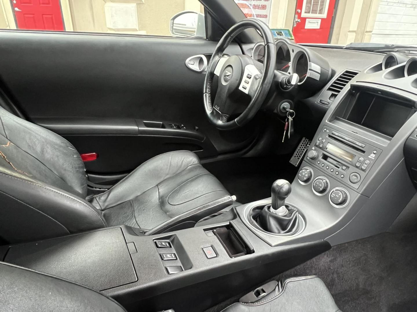 2003 SILVER /Black Nissan 350Z Base (JN1AZ34D93T) with an 3.5L V6 DOHC 24V engine, 6-Speed Manual Overdrive transmission, located at 1018 Brunswick Ave, Trenton, NJ, 08638, (609) 989-0900, 40.240086, -74.748085 - Wow! Yes that is correct, Only 37k miles on this like new 350z! Recently serviced and detailed, Ready for the next owner! This Nissan is like new in every way and a must see and drive to appreciate! Rare 6 speed manual transmission. Please call Anthony to set up an appointment-609-273-5100 - Photo#11