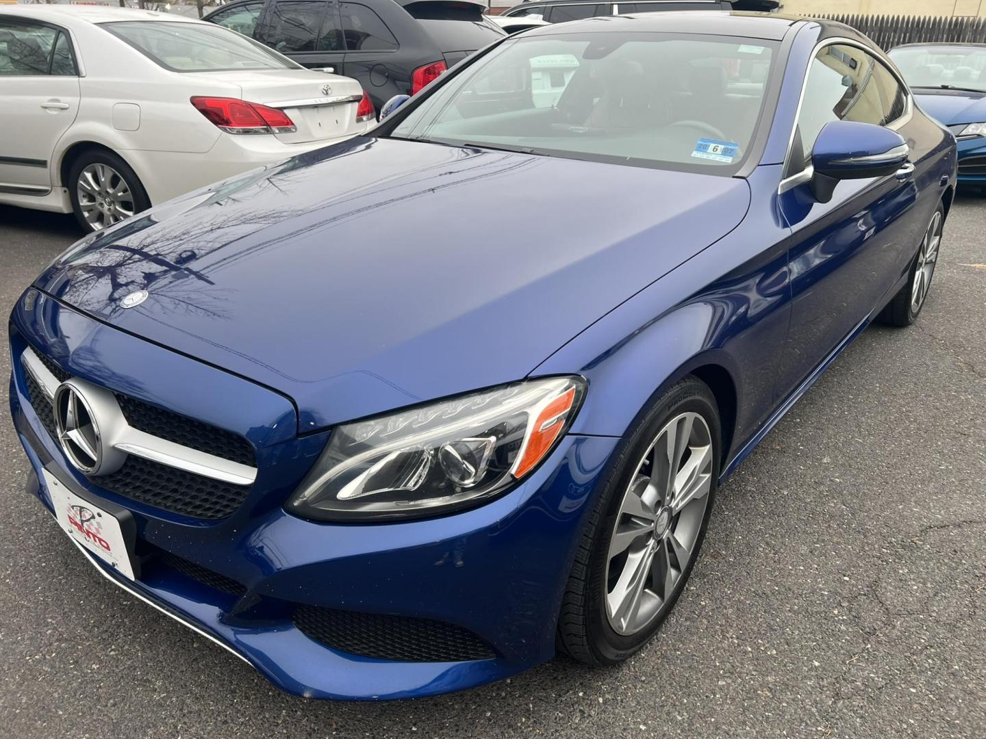 2017 BLUE /Beigh Leather Mercedes-Benz C-Class C300 4MATIC Coupe (WDDWJ4KB7HF) with an 2.0L L4 DOHC 16V TURBO engine, 7A transmission, located at 1018 Brunswick Ave, Trenton, NJ, 08638, (609) 989-0900, 40.240086, -74.748085 - Wow! This Mercedes is as new as they come! Recently serviced and detailed and ceramic coated!! This vehicle has been maintained regularly and looks and drives like a brand new C class! An absolute must see and drive! Please call Anthony to set up an appointment, 609-273-5100 - Photo#3