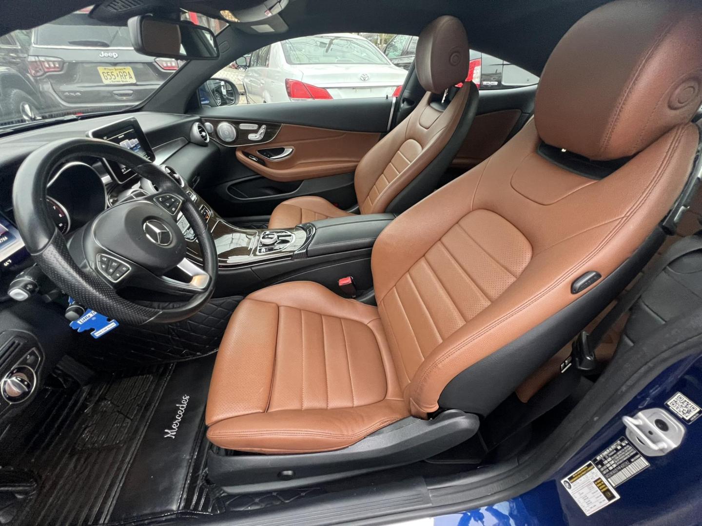 2017 BLUE /Beigh Leather Mercedes-Benz C-Class C300 4MATIC Coupe (WDDWJ4KB7HF) with an 2.0L L4 DOHC 16V TURBO engine, 7A transmission, located at 1018 Brunswick Ave, Trenton, NJ, 08638, (609) 989-0900, 40.240086, -74.748085 - Wow! This Mercedes is as new as they come! Recently serviced and detailed and ceramic coated!! This vehicle has been maintained regularly and looks and drives like a brand new C class! An absolute must see and drive! Please call Anthony to set up an appointment, 609-273-5100 - Photo#24