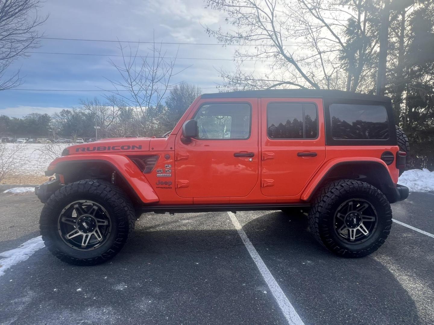 2020 Orange /Black/gray Jeep Wrangler Unlimited Rubicon (1C4HJXFN8LW) with an 2.0L L4 DOHC 16V TURBO engine, 6A transmission, located at 1018 Brunswick Ave, Trenton, NJ, 08638, (609) 989-0900, 40.240086, -74.748085 - Amazing! That is how you describe this Recon Edition Rubicon. Loaded up w the every option and so many extra accessories including 37' tires, warn winch, custom exhaust, tubular nerf doors and more! This one owner Jeep was taken care of and garage kept with no expense spared and an estimate of appro - Photo#3