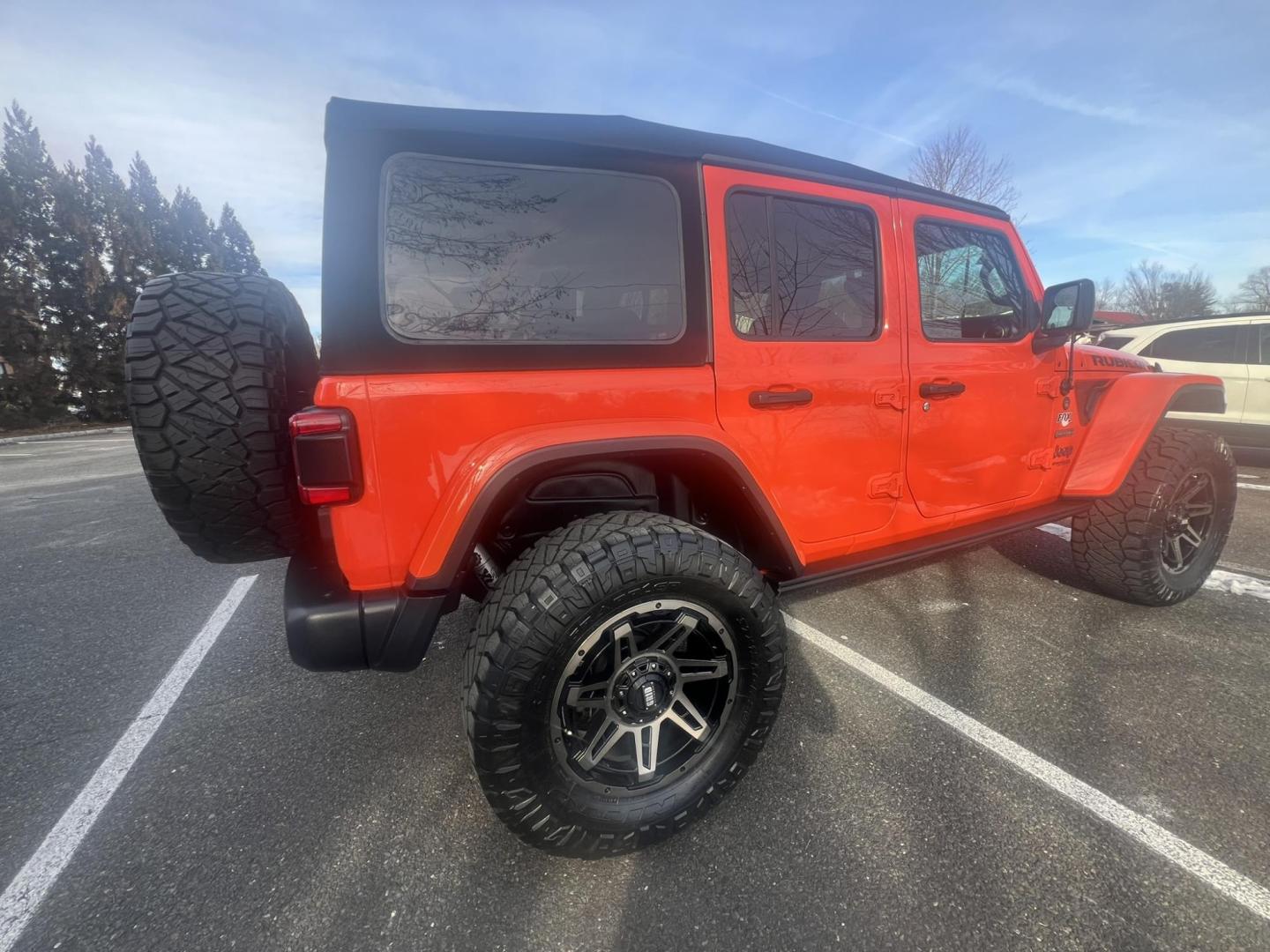 2020 Orange /Black/gray Jeep Wrangler Unlimited Rubicon (1C4HJXFN8LW) with an 2.0L L4 DOHC 16V TURBO engine, 6A transmission, located at 1018 Brunswick Ave, Trenton, NJ, 08638, (609) 989-0900, 40.240086, -74.748085 - Amazing! That is how you describe this Recon Edition Rubicon. Loaded up w the every option and so many extra accessories including 37' tires, warn winch, custom exhaust, tubular nerf doors and more! This one owner Jeep was taken care of and garage kept with no expense spared and an estimate of appro - Photo#12