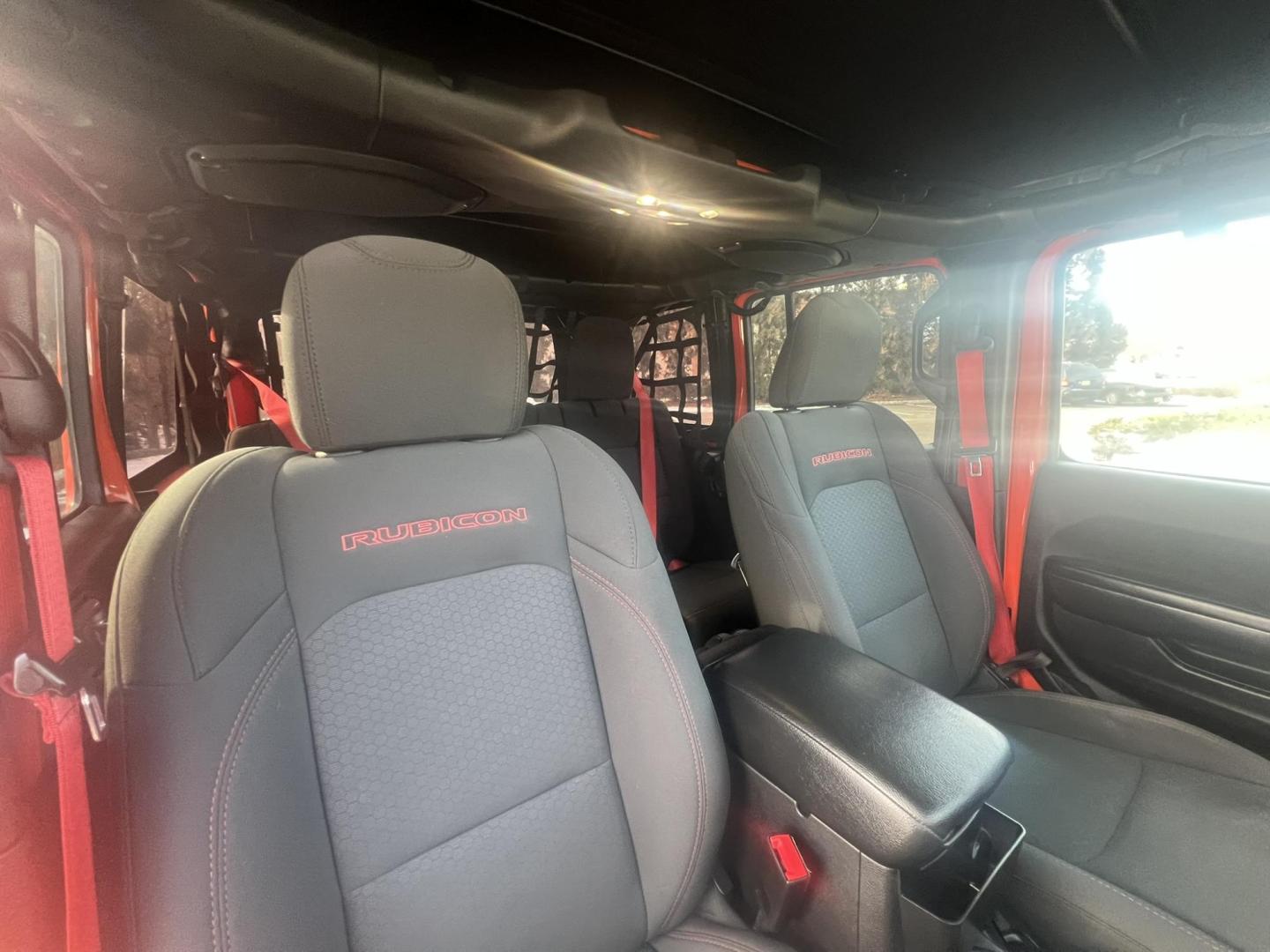 2020 Orange /Black/gray Jeep Wrangler Unlimited Rubicon (1C4HJXFN8LW) with an 2.0L L4 DOHC 16V TURBO engine, 6A transmission, located at 1018 Brunswick Ave, Trenton, NJ, 08638, (609) 989-0900, 40.240086, -74.748085 - Amazing! That is how you describe this Recon Edition Rubicon. Loaded up w the every option and so many extra accessories including 37' tires, warn winch, custom exhaust, tubular nerf doors and more! This one owner Jeep was taken care of and garage kept with no expense spared and an estimate of appro - Photo#19