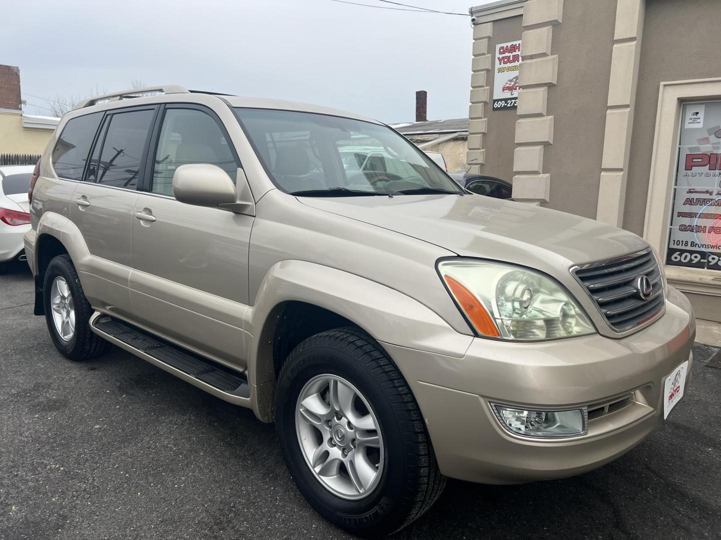 2006 Gold /Tan Lexus GX 470 Sport Utility (JTJBT20X360) with an 4.7L V8 DOHC 32V engine, 5-Speed Automatic Overdrive transmission, located at 1018 Brunswick Ave, Trenton, NJ, 08638, (609) 989-0900, 40.240086, -74.748085 - Here is a very low mile- 1 Owner Lexus GX 470! Very well maintained and ready to go! Fully serviced up with a new timing belt and water pump at 62k miles completed by Lexus Dealer!! Detailed and runs like new! A must see and test drive ASAP, please call Anthony to set up an appointment 609-273-5100 - Photo#1