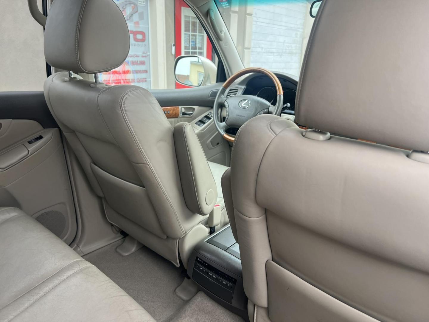 2006 Gold /Tan Lexus GX 470 Sport Utility (JTJBT20X360) with an 4.7L V8 DOHC 32V engine, 5-Speed Automatic Overdrive transmission, located at 1018 Brunswick Ave, Trenton, NJ, 08638, (609) 989-0900, 40.240086, -74.748085 - Here is a very low miled, 1 Owner Lexus GX 470! Very well maintained and ready to go! Fully serviced up with a new timing belt and water pump at 62k miles completed by Lexus Dealer!! Detailed and runs like new! A must see and test drive ASAP, please call Anthony to set up an appointment 609-273-510 - Photo#20