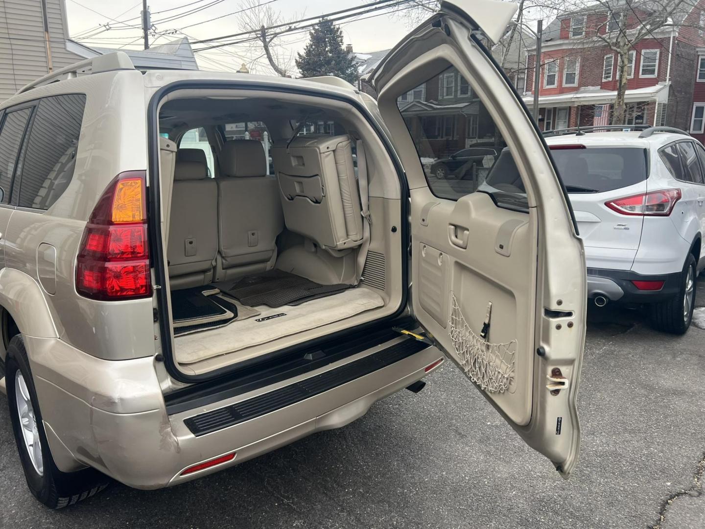 2006 Gold /Tan Lexus GX 470 Sport Utility (JTJBT20X360) with an 4.7L V8 DOHC 32V engine, 5-Speed Automatic Overdrive transmission, located at 1018 Brunswick Ave, Trenton, NJ, 08638, (609) 989-0900, 40.240086, -74.748085 - Here is a very low miled, 1 Owner Lexus GX 470! Very well maintained and ready to go! Fully serviced up with a new timing belt and water pump at 62k miles completed by Lexus Dealer!! Detailed and runs like new! A must see and test drive ASAP, please call Anthony to set up an appointment 609-273-510 - Photo#25