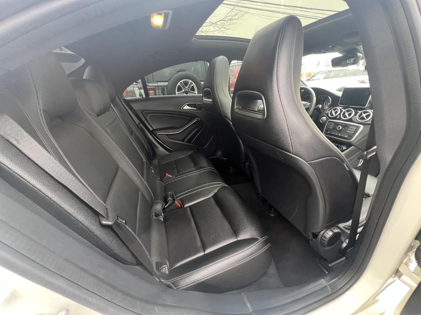 2016 White /Black Leather Mercedes-Benz CLA-Class CLA250 4MATIC (WDDSJ4GB6GN) with an 2.0L L4 DOHC 16V engine, 7A transmission, located at 1018 Brunswick Ave, Trenton, NJ, 08638, (609) 989-0900, 40.240086, -74.748085 - Here is a super clean CLA 4 matic Mercedes! Always serviced by the dealer and in like new condition! Freshly detailed and ready for new ownership, This white beauty will not last long so call Anthony to set up an appointment to see and drive this sharp vehicle! 609-273-5100. - Photo#12